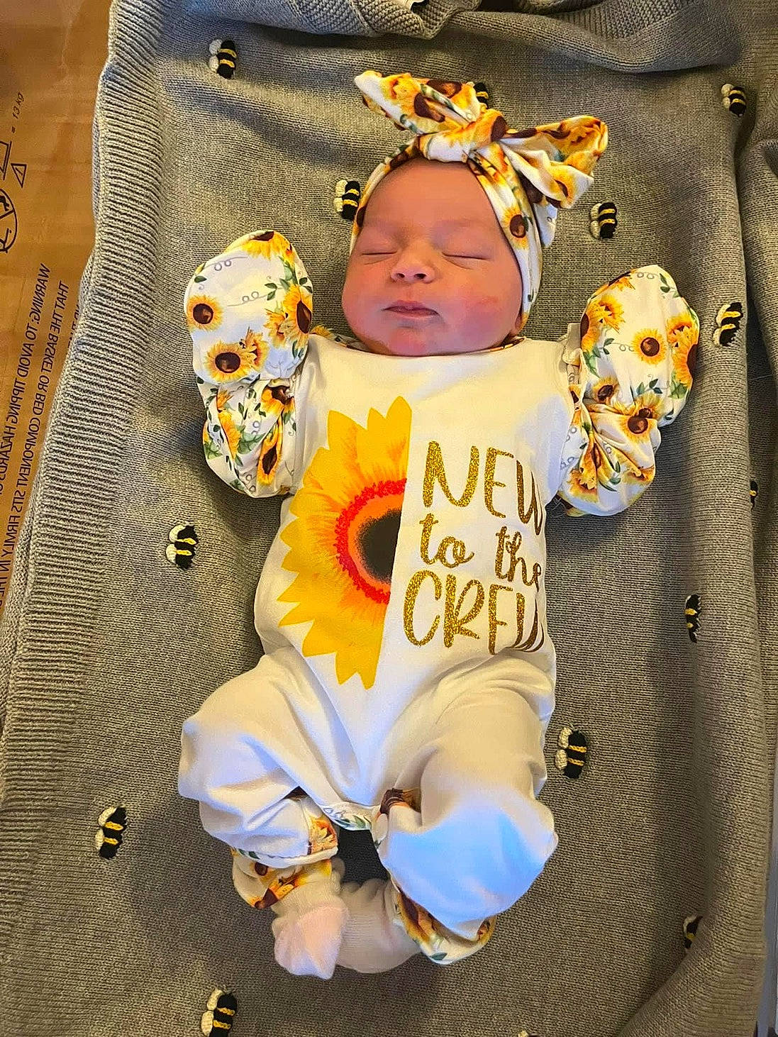 Estella joined the competition — help win amazing prizes! art, baby, baby_products, baby_sleeping, baby_toddler_clothing, brown, child, fashion_accessory, font, happy, headwear, jewellery, linens, orange, pattern, peach, person, pollinator, sleeve, textile