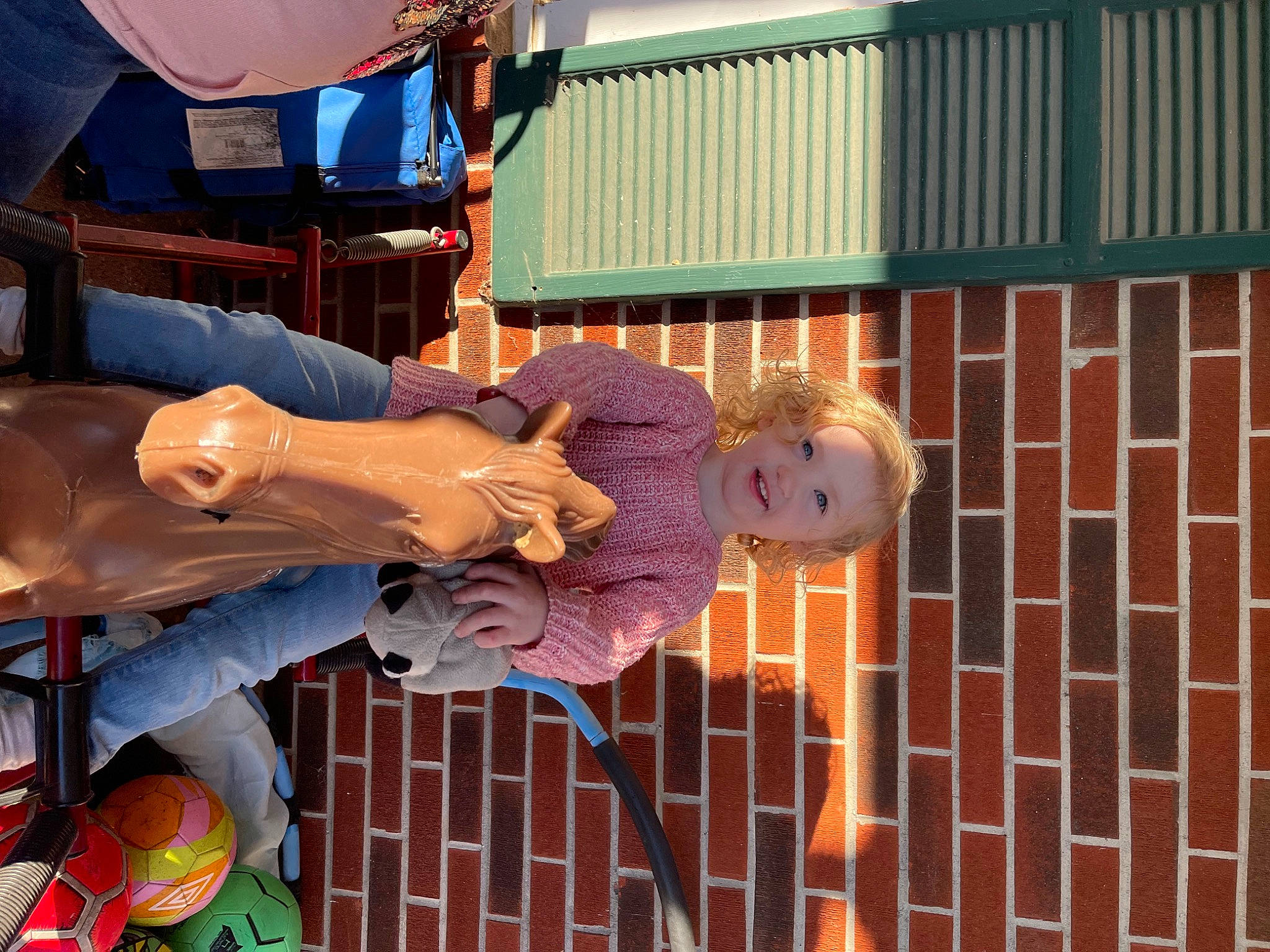 Mckynleigh joined the competition — help win amazing prizes! art, brick, brickwork, event, fun, leisure, lighting, metal, orange, person, smile, statue, water, window, wood