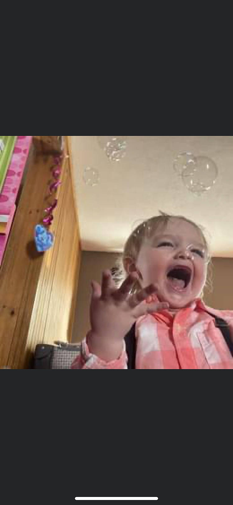 Leon is registered to the contest to win money with this photo: baby, baby_toddler_clothing, child, finger, flooring, fun, gesture, happy, hardwood, mouth, nose, pattern, person, pink, room, shout, sleeve, smile, thumb, toddler