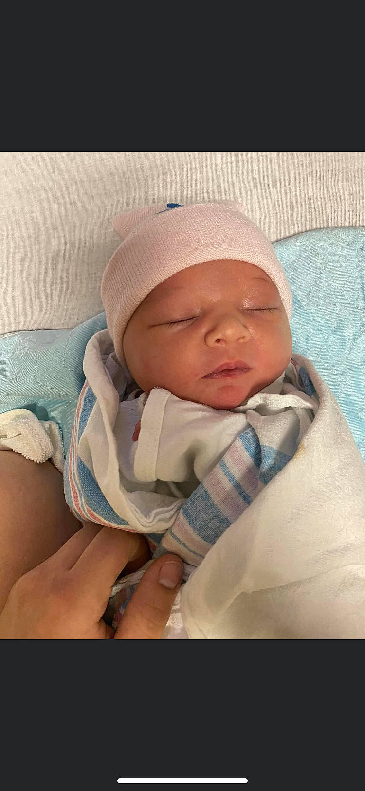 Amerila joined the competition — help win amazing prizes! baby, baby_products, baby_sleeping, baby_toddler_clothing, beanie, bedtime, cap, cheek, child, comfort, headwear, knit_cap, linens, nap, person, product, room, skin, sleep, textile