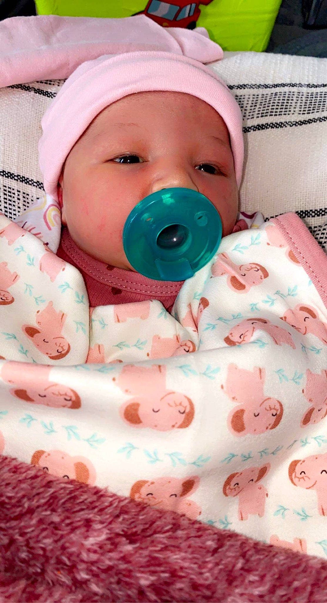 Amerila is registered to the contest to win money with this photo: baby, baby_products, baby_safety, baby_sleeping, baby_toddler_clothing, cap, carmine, cheek, child, comfort, face, headwear, linens, pattern, peach, person, pink, service, skin, sleeve