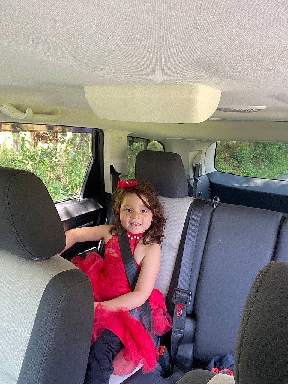Sherry is registered to the contest to win money with this photo: auto_part, automotive_design, automotive_exterior, car, car_seat, car_seat_cover, comfort, family_car, head_restraint, joy, luxury_vehicle, mid_size_car, motor_vehicle, person, personal_luxury_car, plant, smile, toddler, travel, vehicle