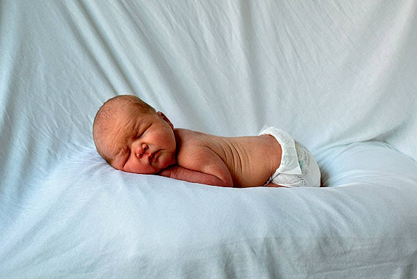 Kolby joined the competition — help win amazing prizes! baby, baby_sleeping, barefoot, bedding, bedtime, child, comfort, event, flesh, foot, human_leg, linens, nap, person, portrait_photography, room, sitting, skin, sleep, sorrow