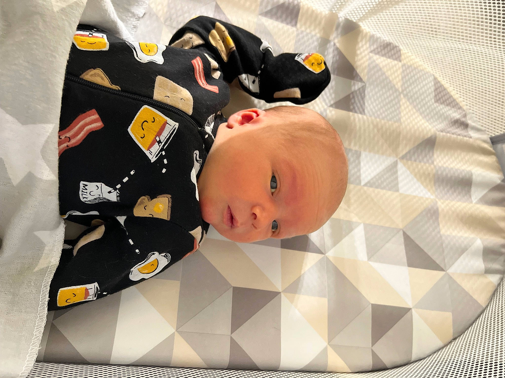 Kolby joined the competition — help win amazing prizes! baby, baby_products, baby_toddler_clothing, carmine, child, comfort, flooring, linens, pattern, person, room, sleeve, toddler