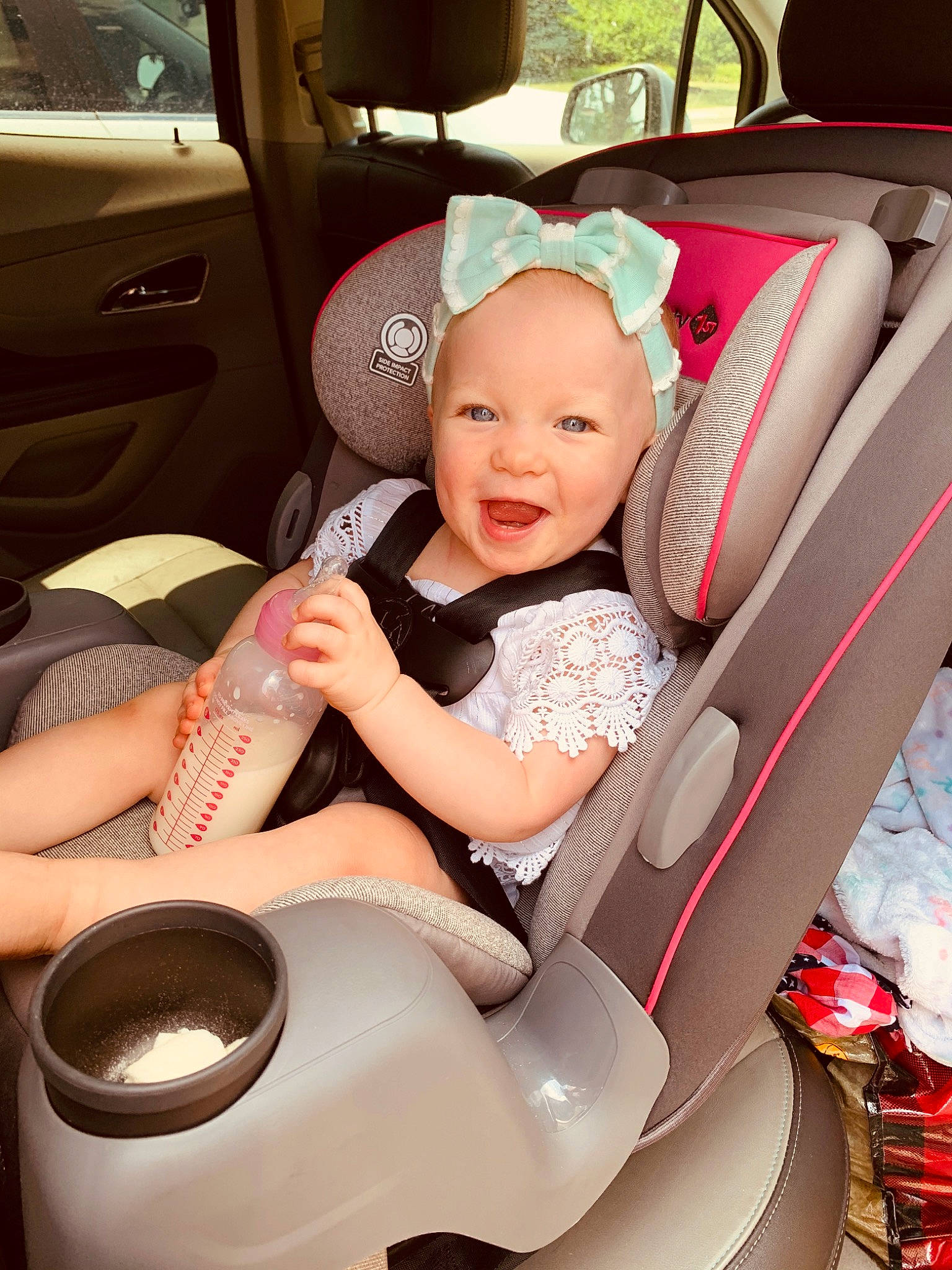 Piper is registered to the contest to win money with this photo: auto_part, automotive_design, baby, baby_carriage, baby_in_car_seat, baby_products, car, car_seat, car_seat_cover, child, city_car, comfort, family_car, person, product, toddler, vehicle