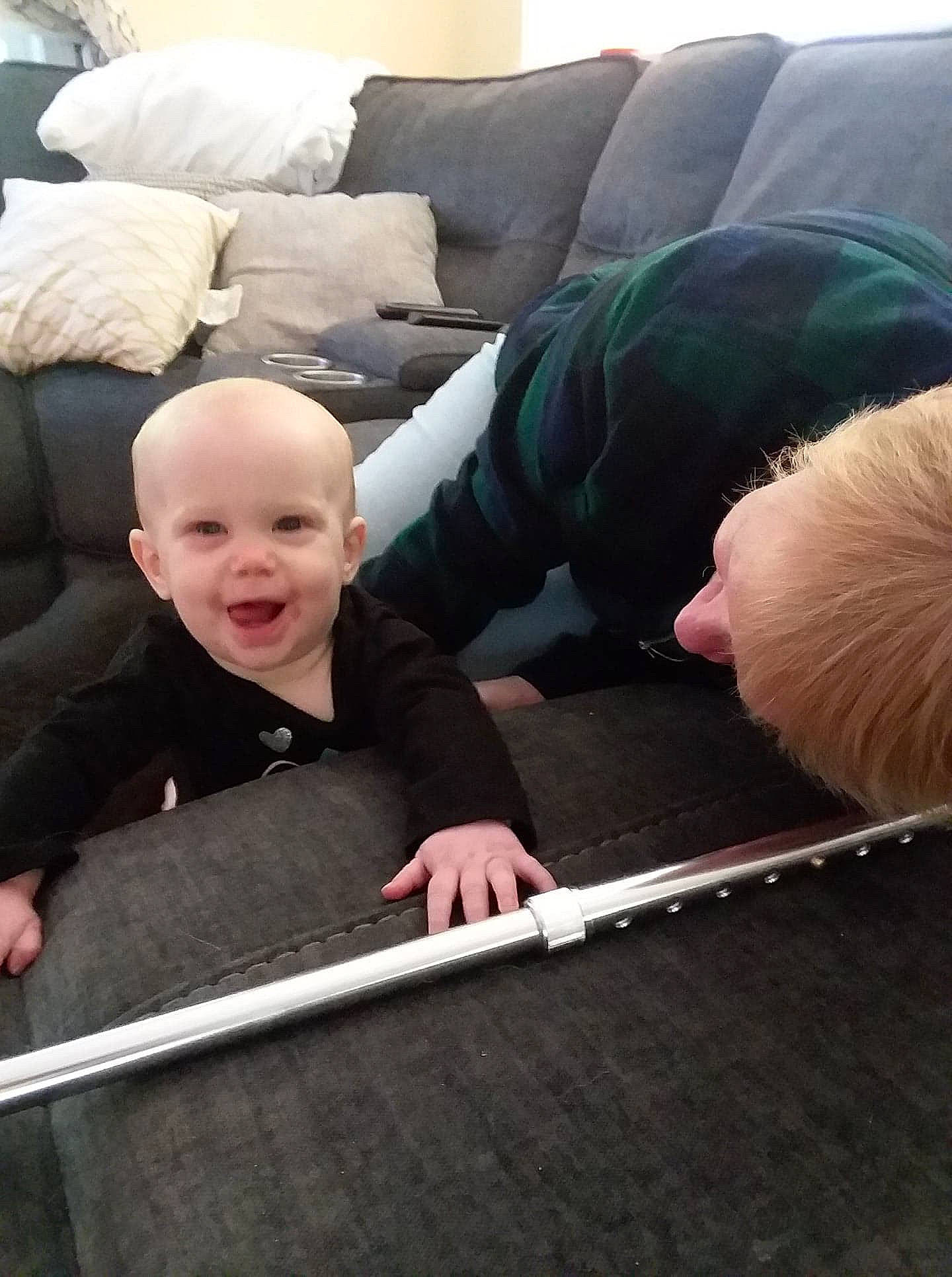 Emma joined the competition — help win amazing prizes! baby, child, finger, floor, flooring, hand, person, roof, sitting, toddler