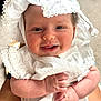 Livvy joined the competition — help win amazing prizes! baby, infant, smiling, white_clothing, bonnet, hands, cute, face, portrait, closeup, happy, child, skin, embroidery, indoors, carpet, person, newborn, cute_expression, soft_lighting