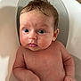 baby, infant, bathtub, water, wet_hair, skin, child, cute, chubby_cheeks, bath_time, human, portrait, young, indoors, expression, curious, hand, face, eyes, naked