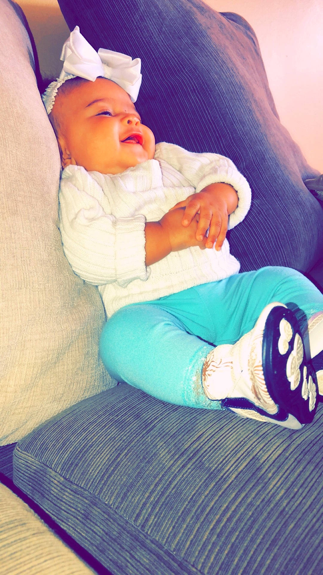 Nastassja is registered to the contest to win money with this photo: child, girl, headgear, infant, leg, product, purple, sitting, skin, textile, toddler