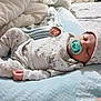 baby, sleeping, pacifier, pajamas, hat, blanket, bed, infant, child, cozy, soft, cute, resting, newborn, indoors, comfort, peaceful, person, sleep, nursery