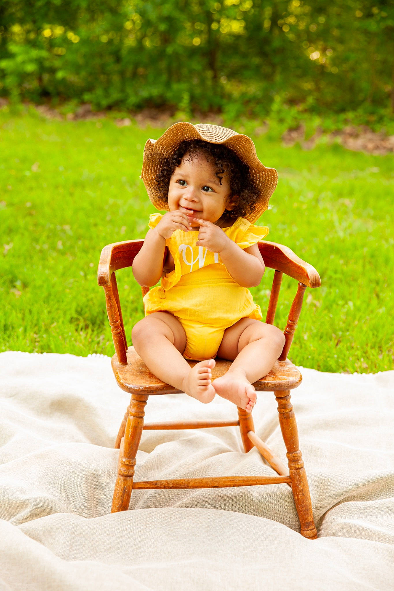 Brooklyn is registered to the contest to win money with this photo: black_hair, eye, fawn, grass, hair, happy, head, human_body, human_leg, leg, leisure, people_in_nature, person, plant, shorts, smile, summer, thigh, toy, tree