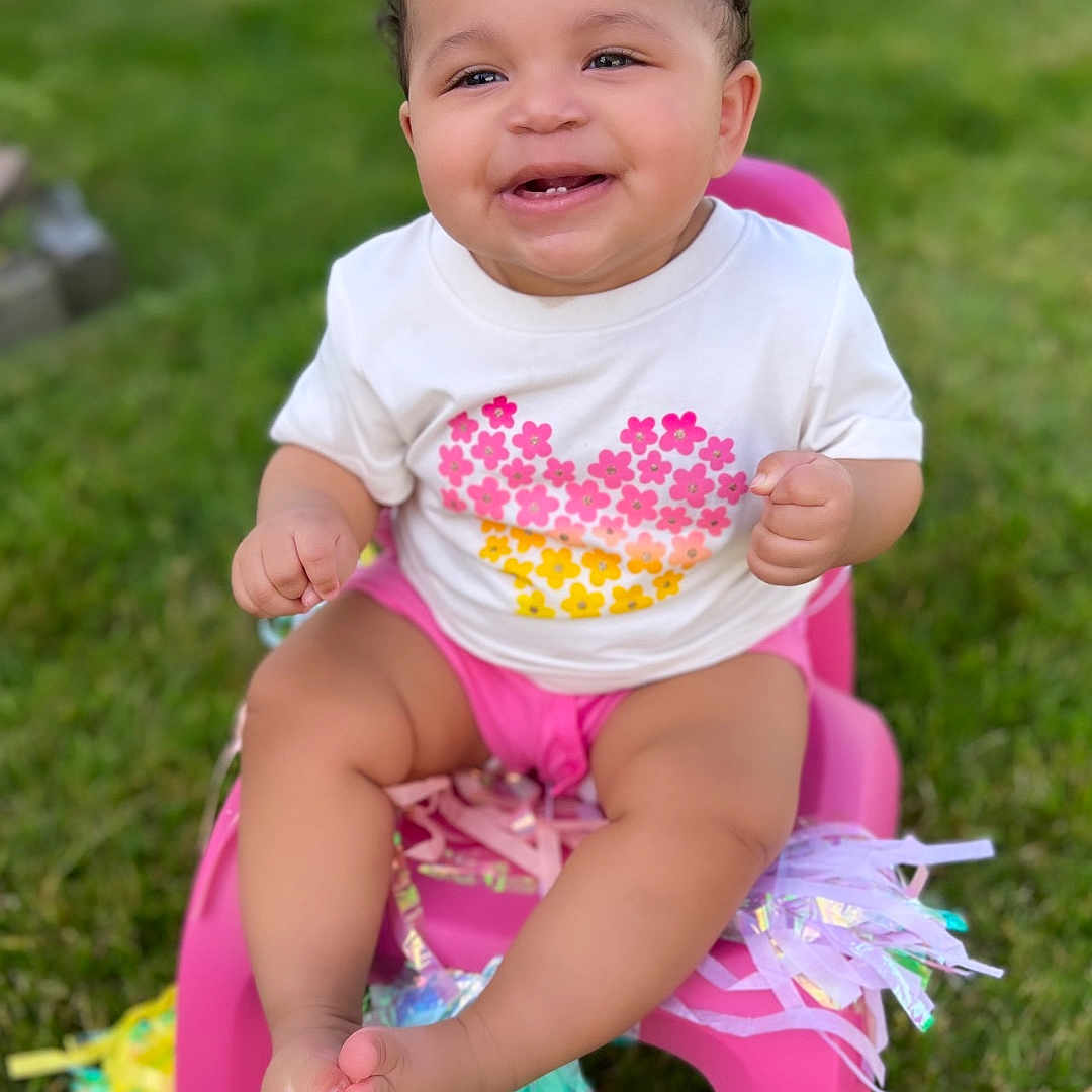 Leelynne joined the competition — help win amazing prizes! baby, backyard, bathroom, clothing, face, flower, grass, head, indoors, lawn, nature, outdoors, person, photography, plant, portrait, room, shorts, sitting, toilet