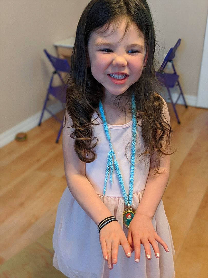 Aurelia is registered to the contest to win money with this photo: child, child_model, fashion_accessory, joy, long_hair, neck, necklace, person, smile, toddler