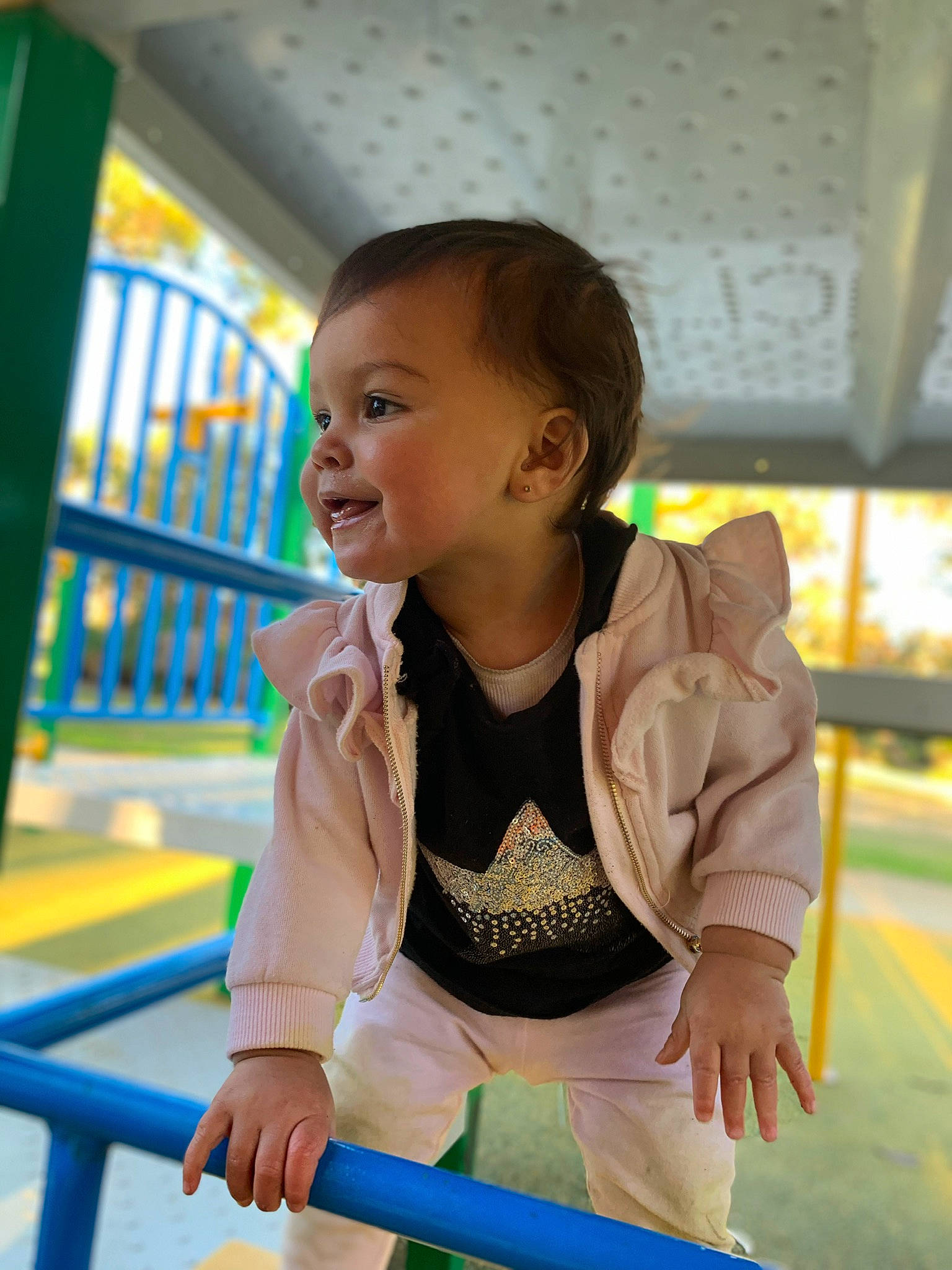 Deliah is registered to the contest to win money with this photo: baby, child, fun, leisure, person, play, playground, recreation, smile, toddler, yellow