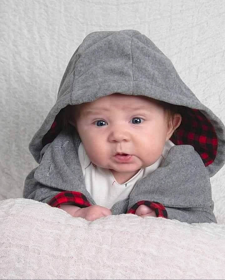 Calliope joined the competition — help win amazing prizes! baby, baby_toddler_clothing, beanie, cap, carmine, cheek, child, comfort, eye, fashion_accessory, fur, headgear, headwear, lip, outerwear, person, portrait_photography, sitting, sleeve, toddler