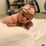 Ariella joined the competition — help win amazing prizes! baby, baby_clothing, blanket, carpet, child, closeup, curious, cute, face, hands, headband, home, indoor, infant, lying_down, newborn, pink_bow, portrait, soft_texture, wide_eyes