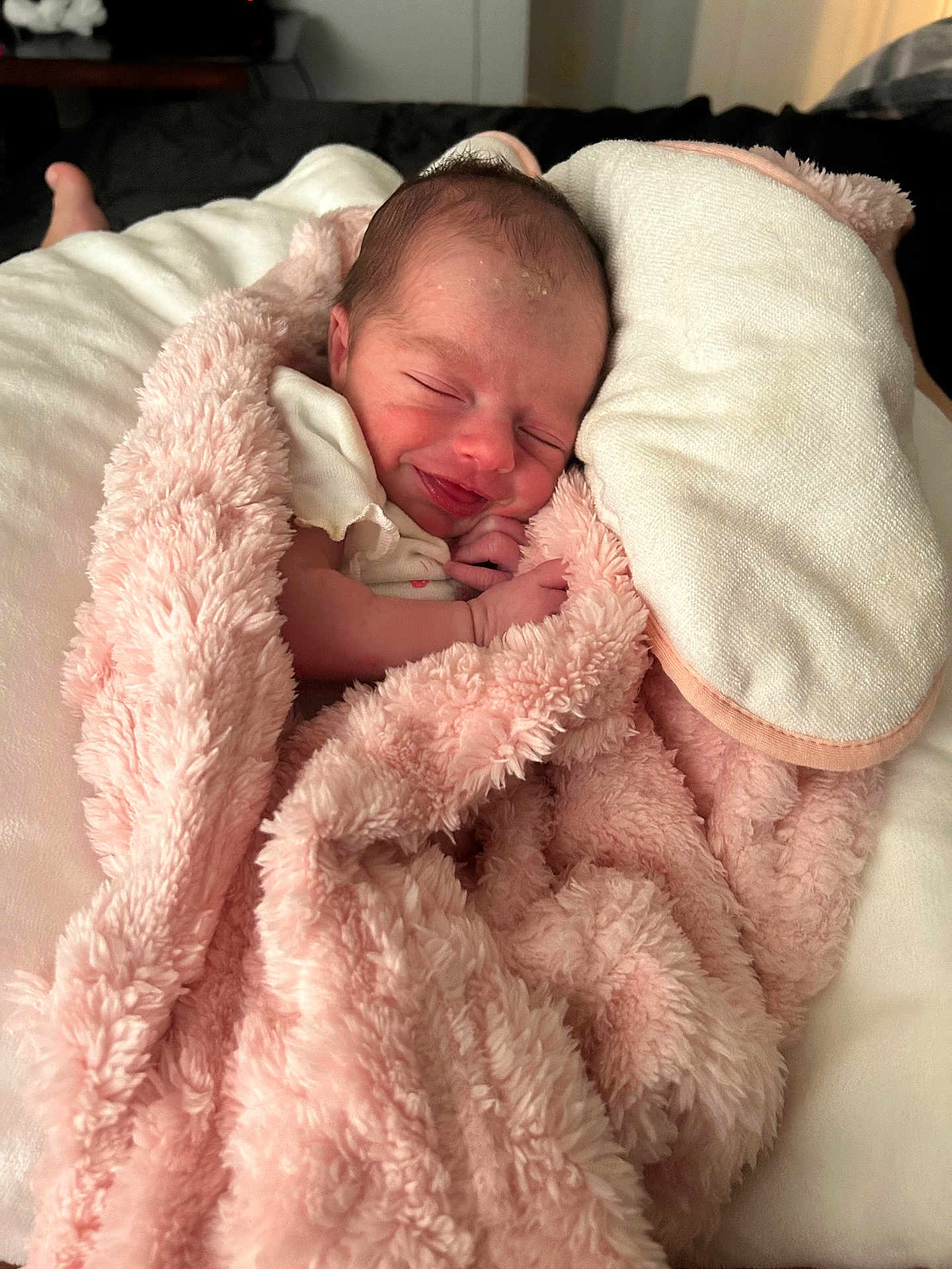 Ariella joined the competition — help win amazing prizes! newborn, baby, smiling, blanket, pink, fluffy, pillow, sleeping, cozy, infant, cute, soft, wrapped, bed, resting, peaceful, skin, hand, head, portrait