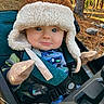 Jade joined the competition — help win amazing prizes! baby, babywearing, blue_eyes, child, clothing, cute, daylight, forest, hat, infant, mittens, nature, outdoor, person, portrait, seatbelt, smile, stroller, trees, warm_clothing