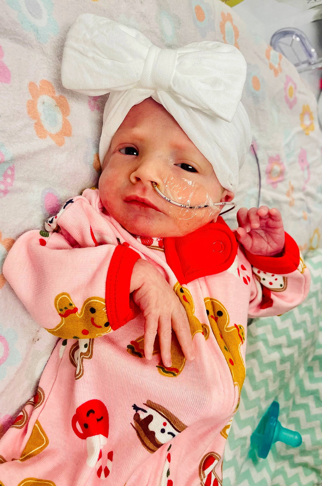 Wrenley is registered to the contest to win money with this photo: baby, baby_products, baby_toddler_clothing, cheek, child, collar, event, face, happy, hat, head, headwear, human_body, outerwear, pattern, peach, person, pink, sleeve, smile