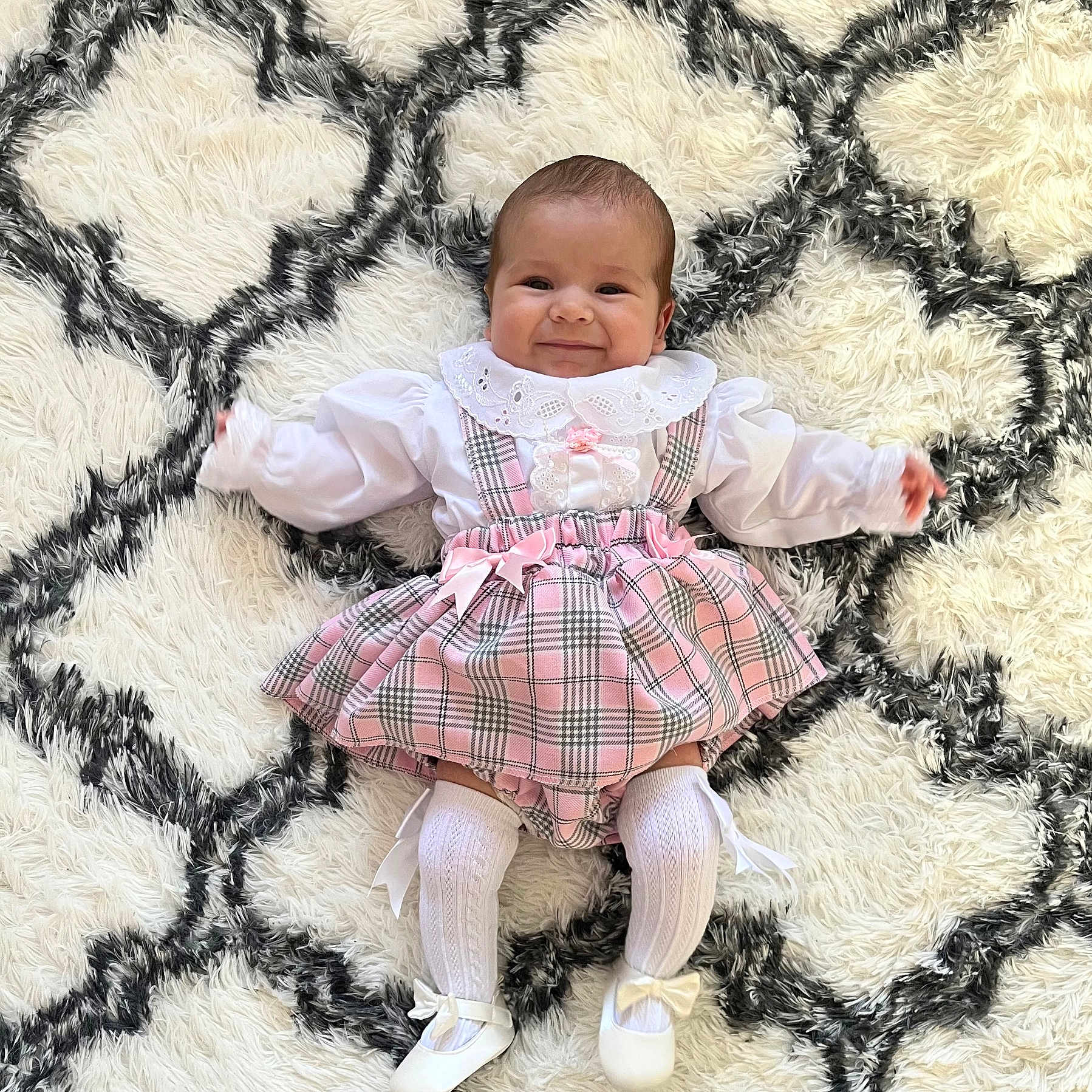 Maisie-Rose is registered to the contest to win money with this photo: baby, blanket, bonnet, clothing, dress, face, footwear, happy, hat, head, homedecor, newborn, pants, person, photography, portrait, quilt, shoe, sitting, toy