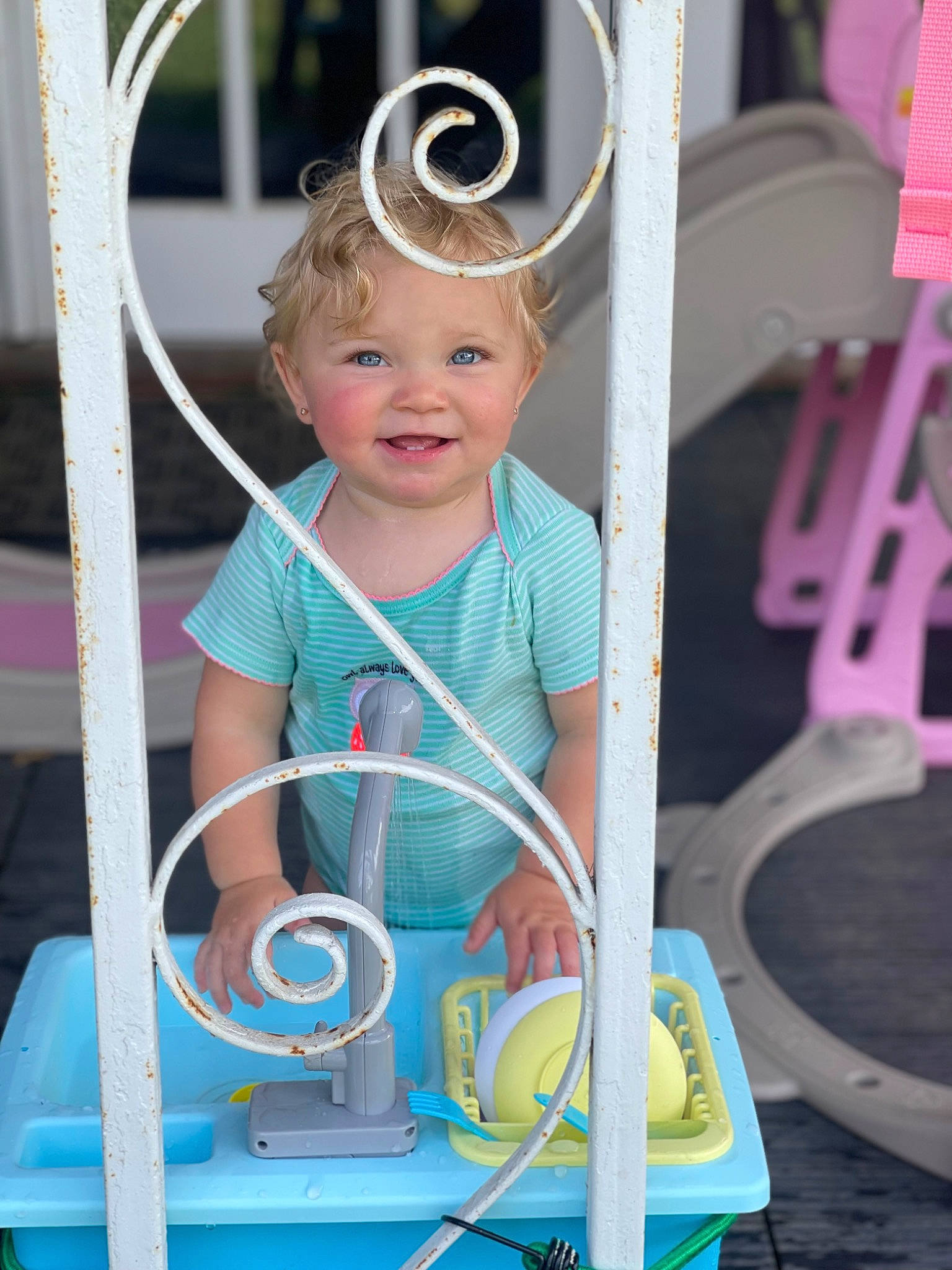 Mckenzie is registered to the contest to win money with this photo: auto_part, automotive_wheel_system, child, electric_blue, eyewear, facial_expression, fun, glasses, goggles, happy, hat, joy, leisure, magenta, person, pink, play, recreation, smile, spoke