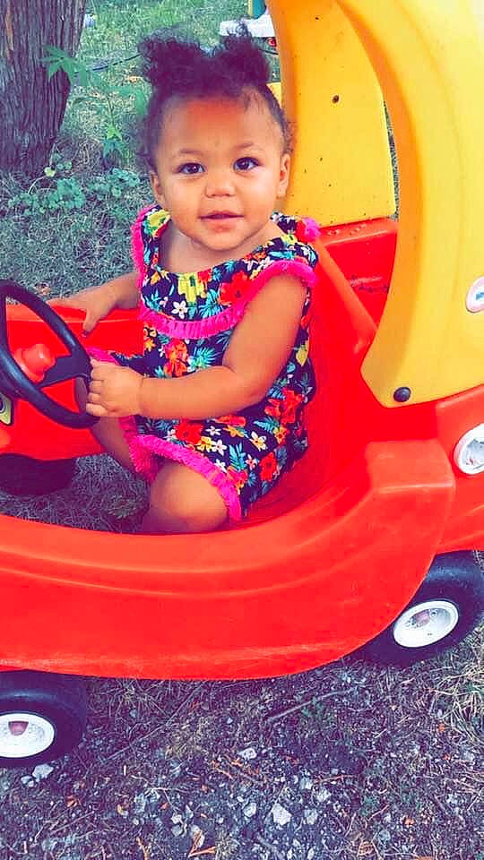 Princess Nalani is registered to the contest to win money with this photo: baby, baby_products, baby_toys, child, fun, leisure, outdoor_play_equipment, person, play, playground, product, public_space, riding_toy, toddler, toy, vehicle