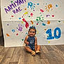 Aamiyah joined the competition — help win amazing prizes! child, toddler, smiling, denim_overalls, sandals, handprints, footprints, colorful, birthday, celebration, floor, wooden_floor, poster, paint, hearts, indoor, person, happy, cute, baby