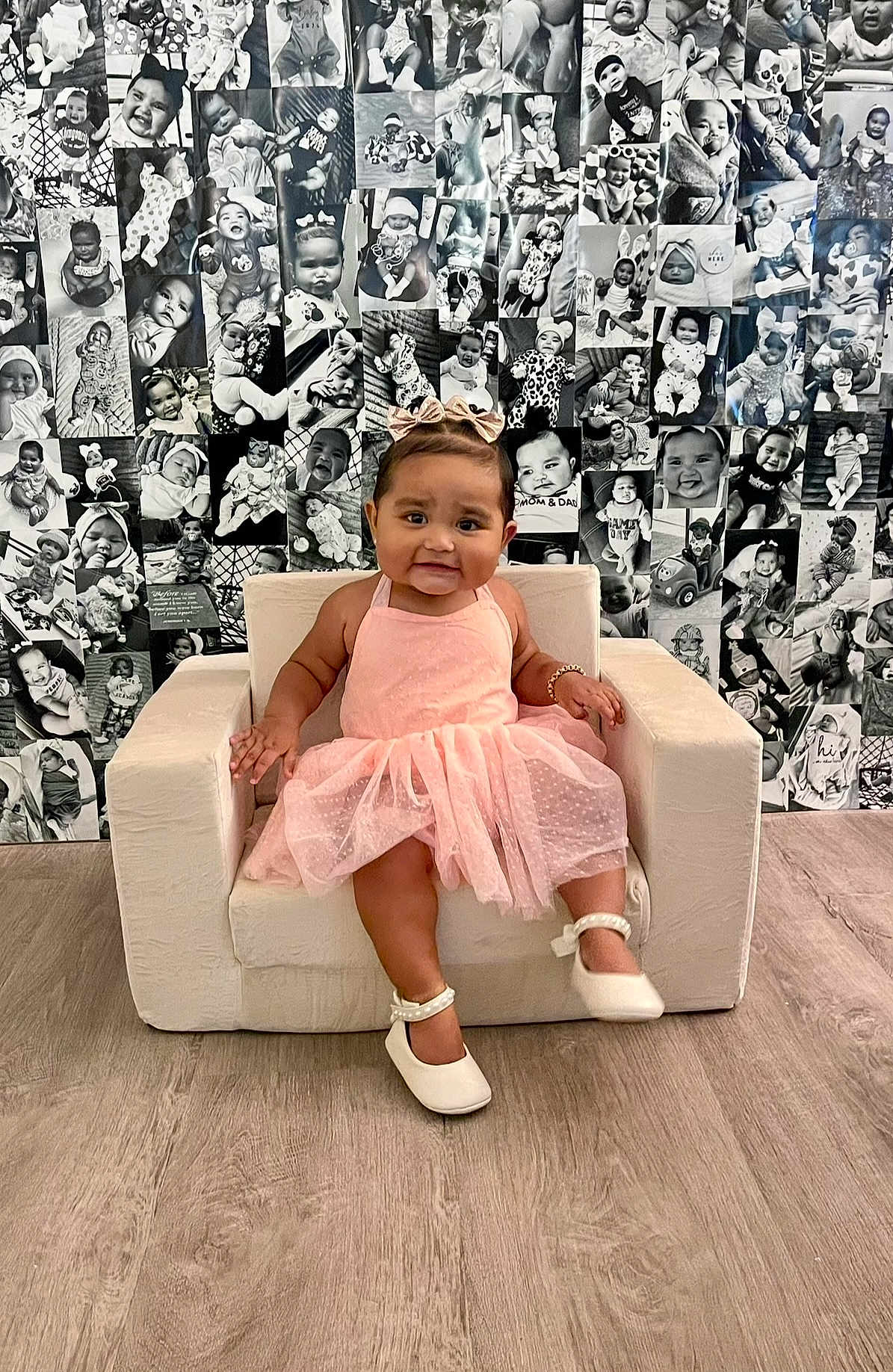 Aamiyah joined the competition — help win amazing prizes! baby, child, dress, pink, shoes, armchair, floor, wall, photo_collage, black_and_white, smiling, portrait, indoor, cute, girl, headband, bracelet, sitting, flooring, person