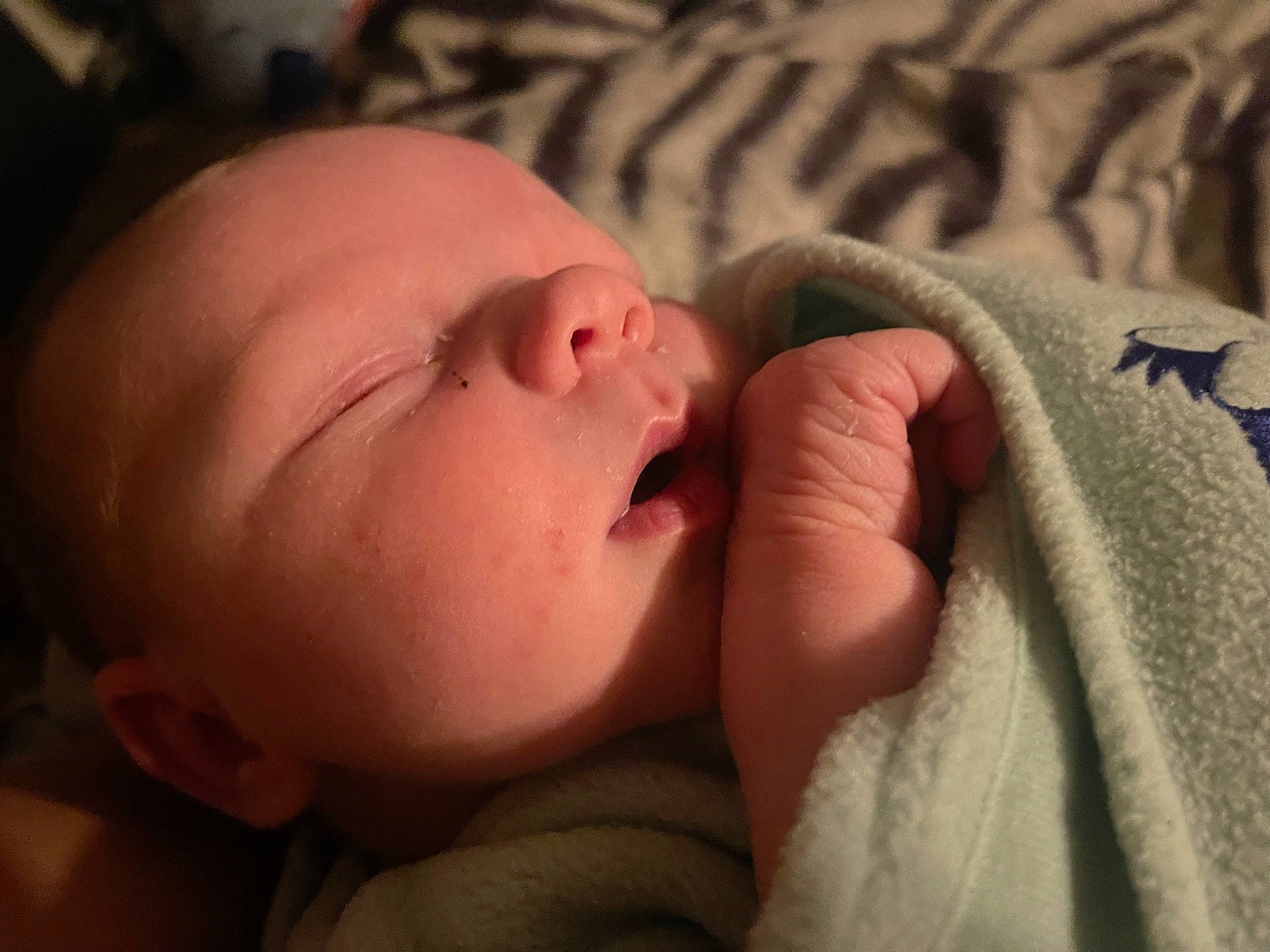 Xaviar is registered to the contest to win money with this photo: arm, baby, cheek, comfort, ear, eye, eyebrow, eyelash, gesture, hand, head, human_body, iris, lip, mouth, nail, neck, nose, person, skin