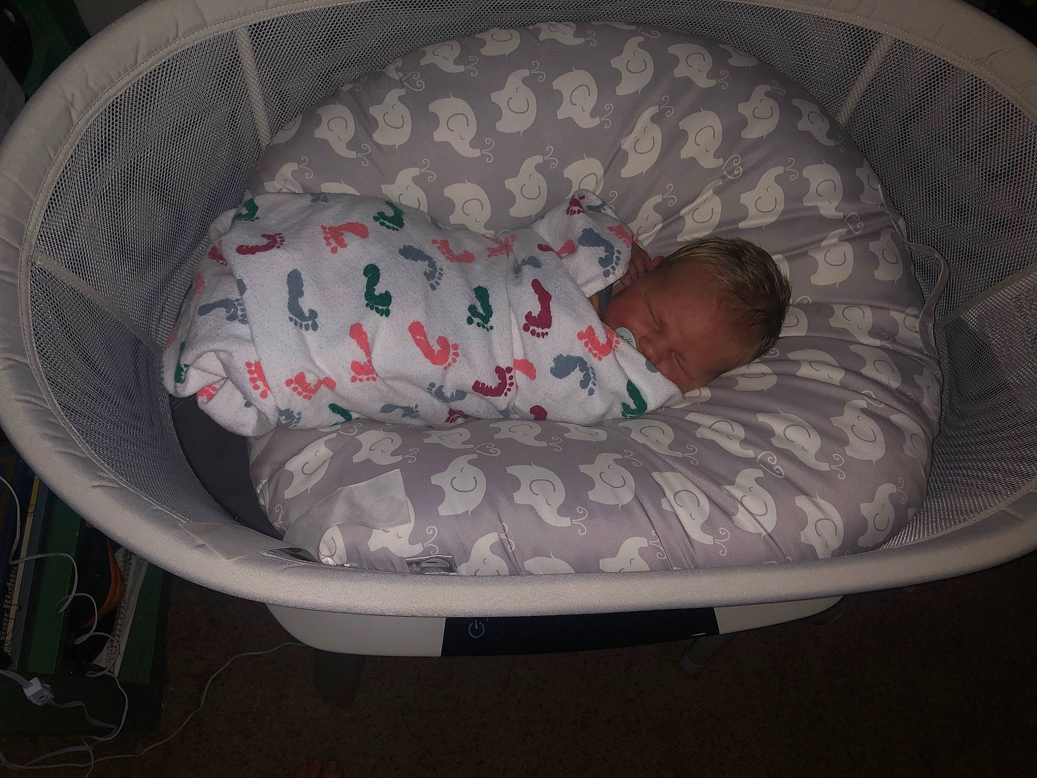 Xaviar is registered to the contest to win money with this photo: baby, baby_products, baby_safety, baby_sleeping, baby_toddler_clothing, baby_toys, bed, bedtime, carmine, child, comfort, cradle, head, infant_bed, laundry_basket, linens, nap, pattern, person, room