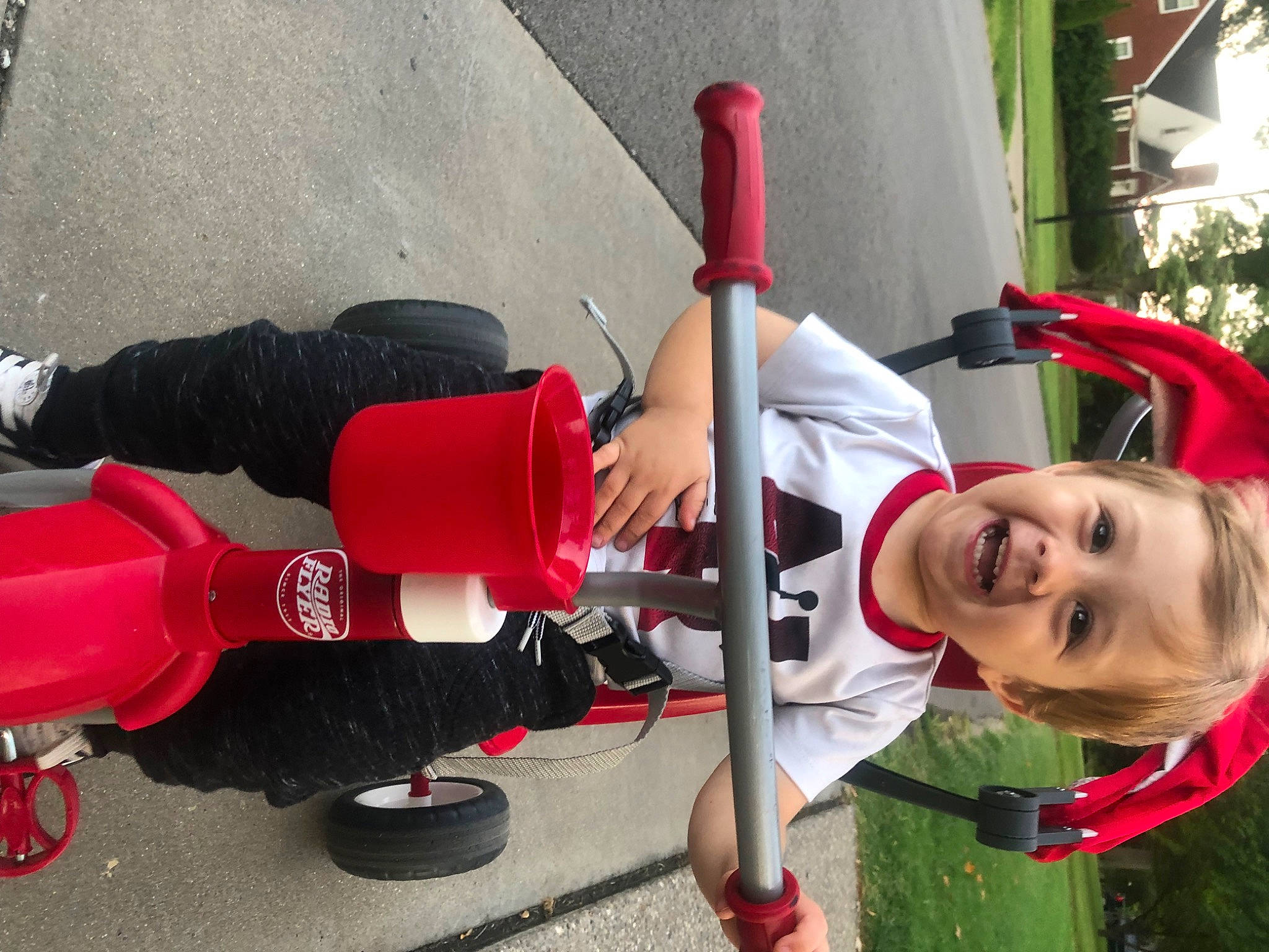 Hayes is registered to the contest to win money with this photo: active_pants, boot, carmine, clothing, costume, fun, human_leg, joy, knee, leg, leisure, person, physical_fitness, plant, recreation, red, shoe, shorts, smile, sportswear