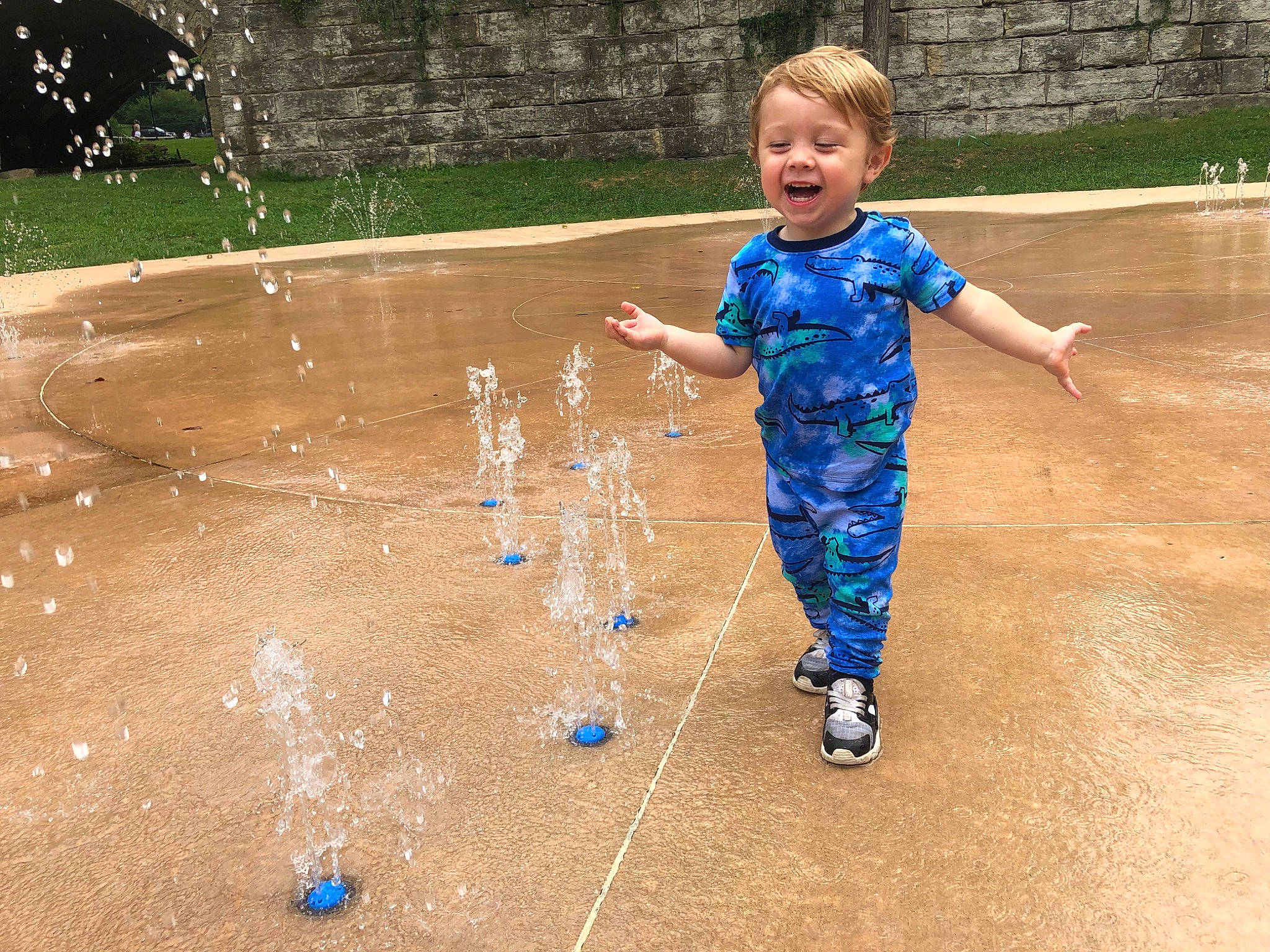 Hayes joined the competition — help win amazing prizes! child, concrete, electric_blue, flooring, fountain, fun, glass, grass, happy, leisure, people_in_nature, person, plant, play, recreation, road_surface, smile, soil, toddler, water