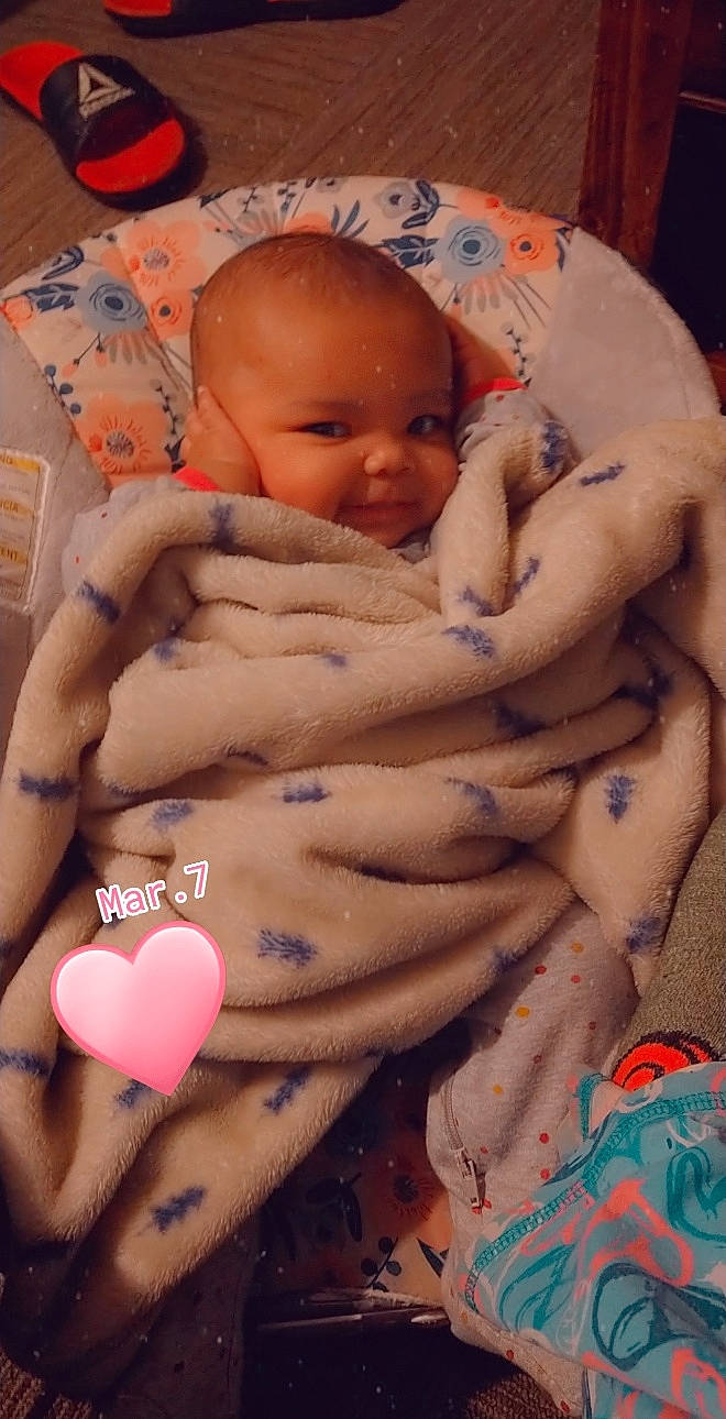 Aria is registered to the contest to win money with this photo: abdomen, baby, barechested, cheek, chest, comfort, face, finger, hand, human_body, leg, mouth, nail, neck, organ, person, skin, stomach, thumb, toddler