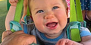 Hudson joined the competition — help win amazing prizes! baby, child, swing, smile, happy, hand, blue_nail_polish, clothing, outdoor, playground, person, fabric, strap, green, pink, dress, fun, summer, people, face