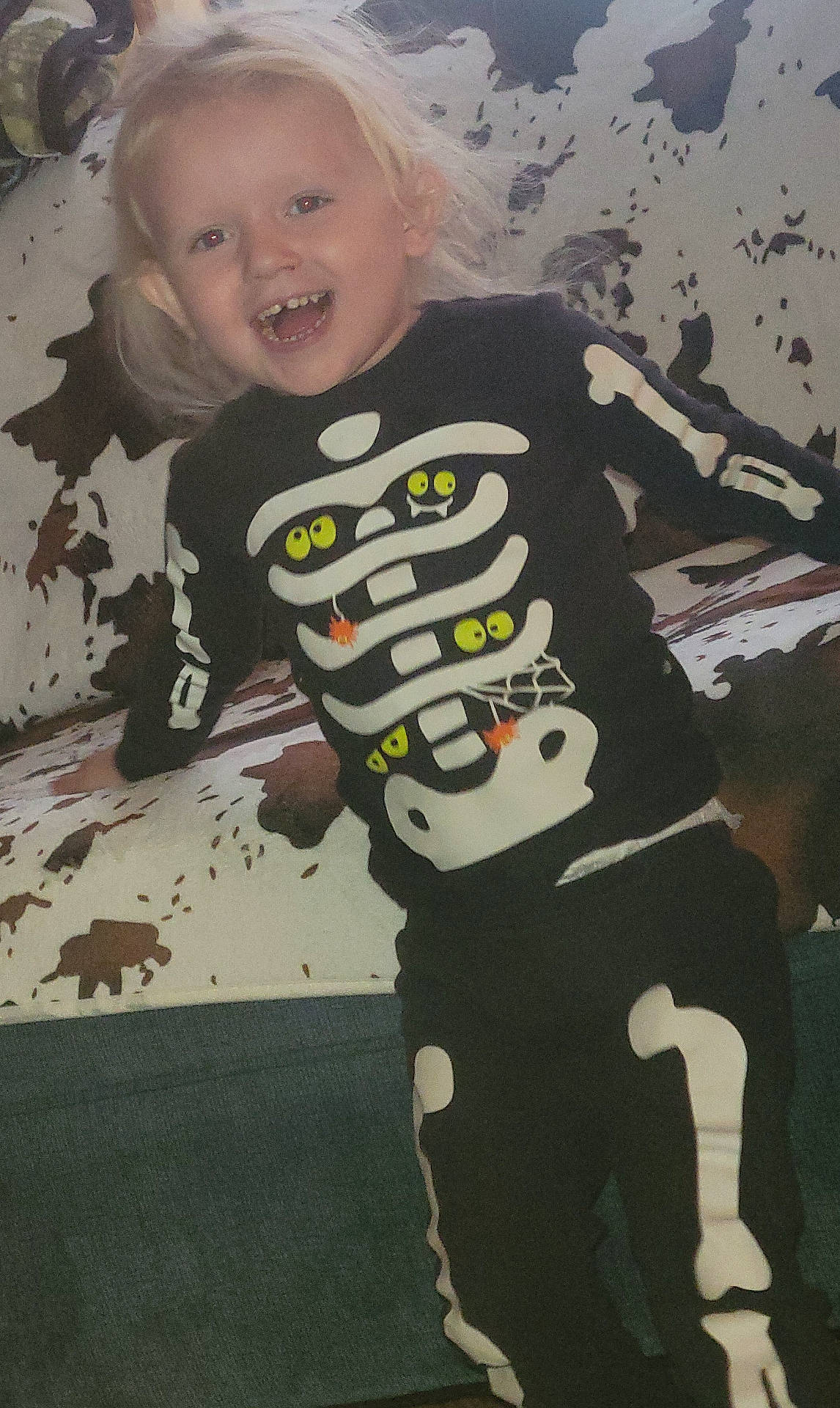 Kylah joined the competition — help win amazing prizes! baby, blonde, bodypart, clothing, couch, face, furniture, hair, happy, head, indoors, laughing, mouth, pants, person, photography, portrait, shirt, t_shirt, teeth