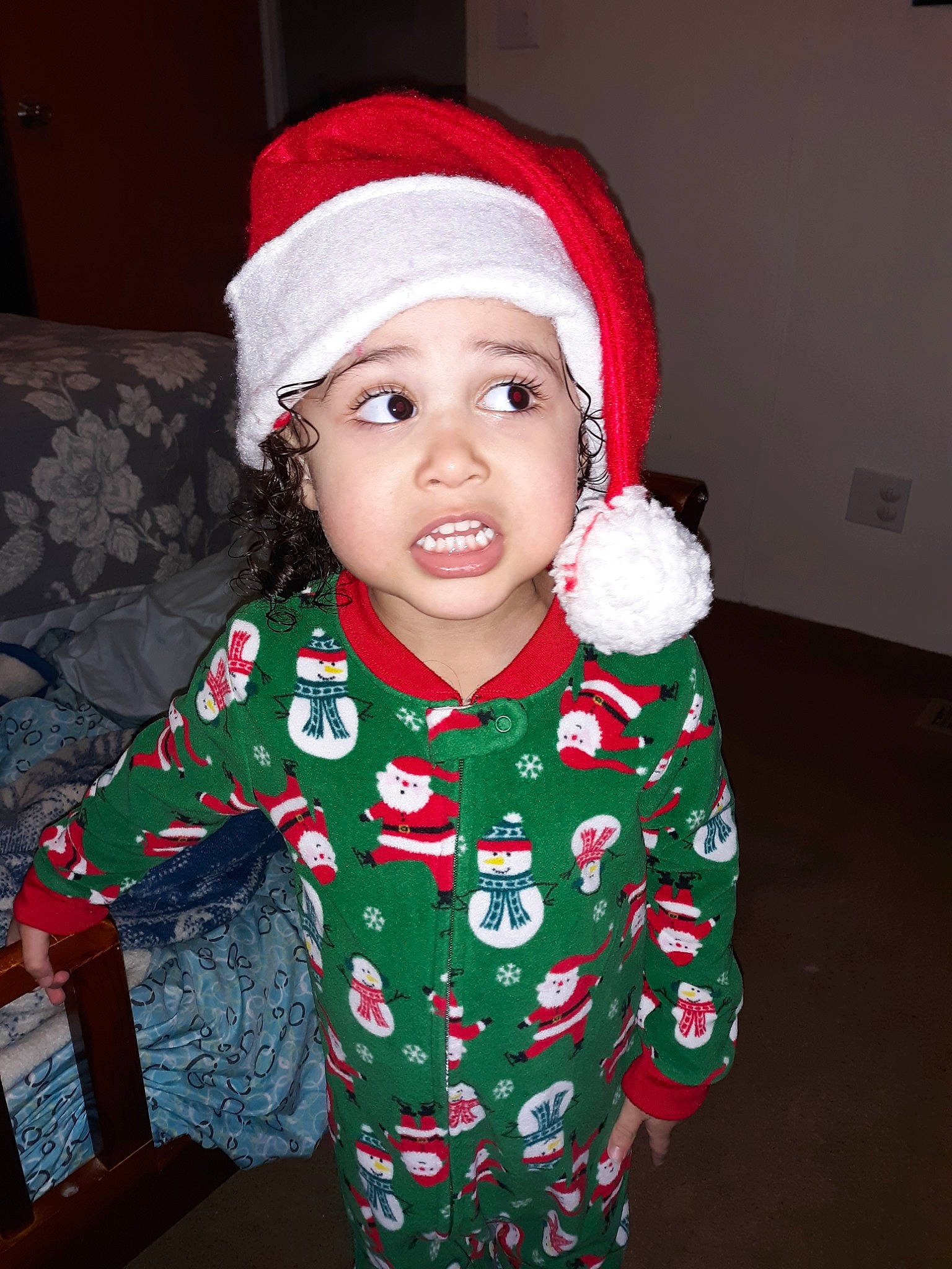Jaiden joined the competition — help win amazing prizes! child, christmas, christmas_eve, event, fictional_character, headgear, headwear, holiday, outerwear, pajamas, person, smile, surprise, sweater, toddler