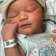 Prince joined the competition — help win amazing prizes! newborn, baby, sleeping, hat, onesie, cartoon_character, hospital_wristband, infant, closeup, face, hand, skin, cute, peaceful, clothing, bed, blanket, resting, indoors, portrait