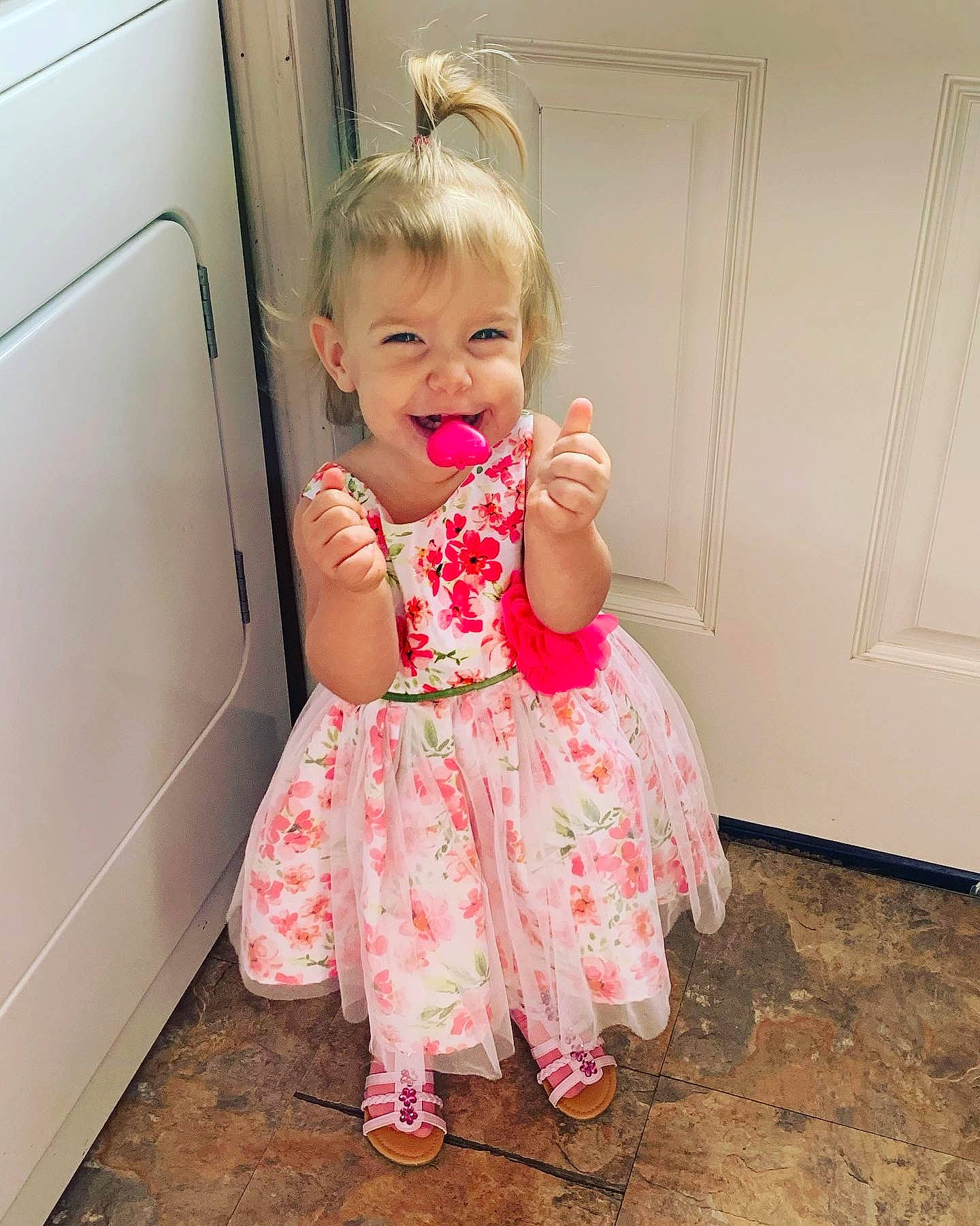 Kaydence joined the competition — help win amazing prizes! baby, baby_toddler_clothing, blond, cheek, child, dress, finger, lip, pattern, person, pink, play, ruffle, sitting, skin, smile, standing, toddler