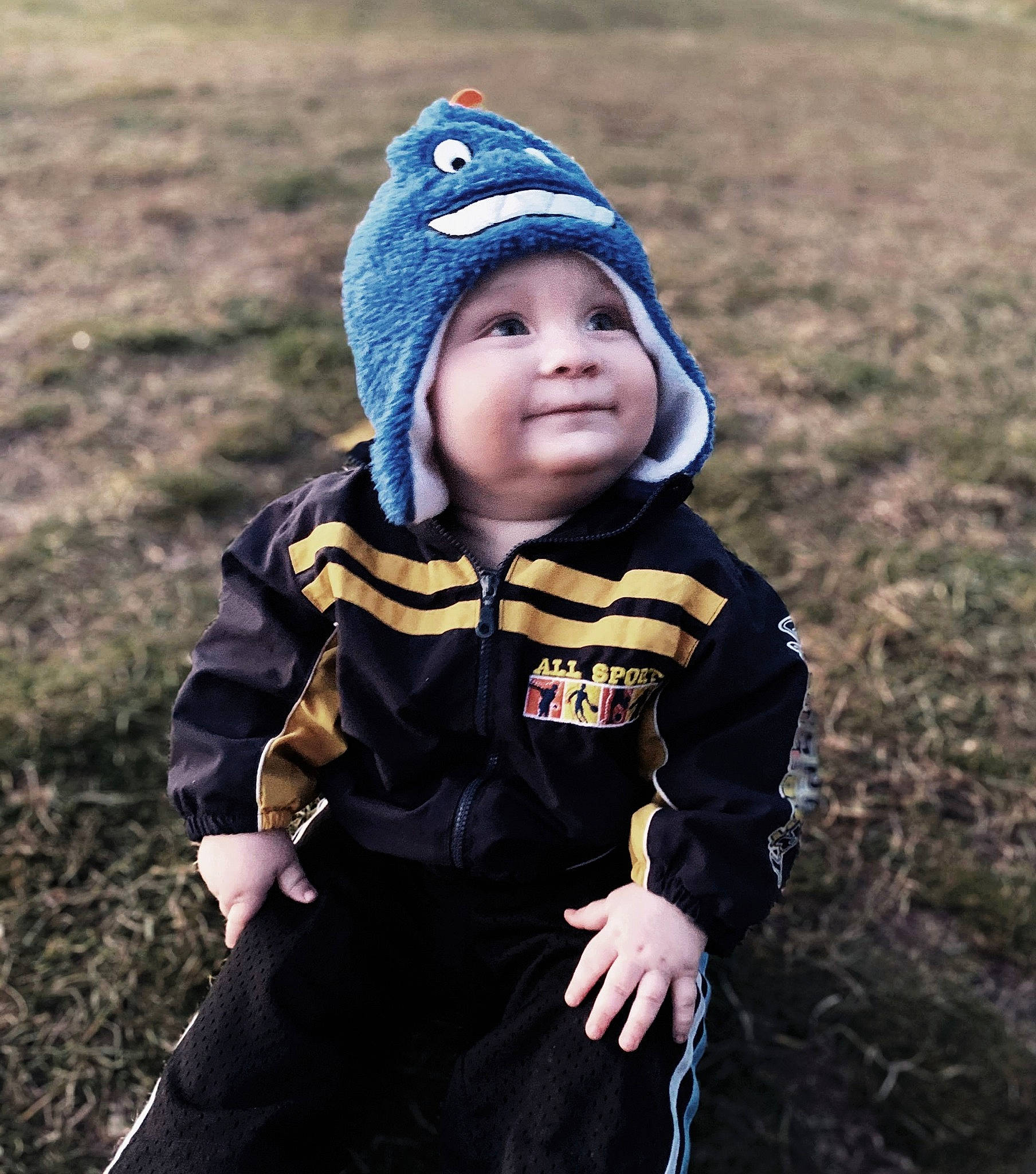 Graysen is registered to the contest to win money with this photo: baby, baby_laughing, baby_toddler_clothing, beanie, bonnet, cheek, child, cool, facial_expression, headgear, headwear, hood, joy, knit_cap, people_in_nature, person, portrait_photography, prairie, skin, sleeve
