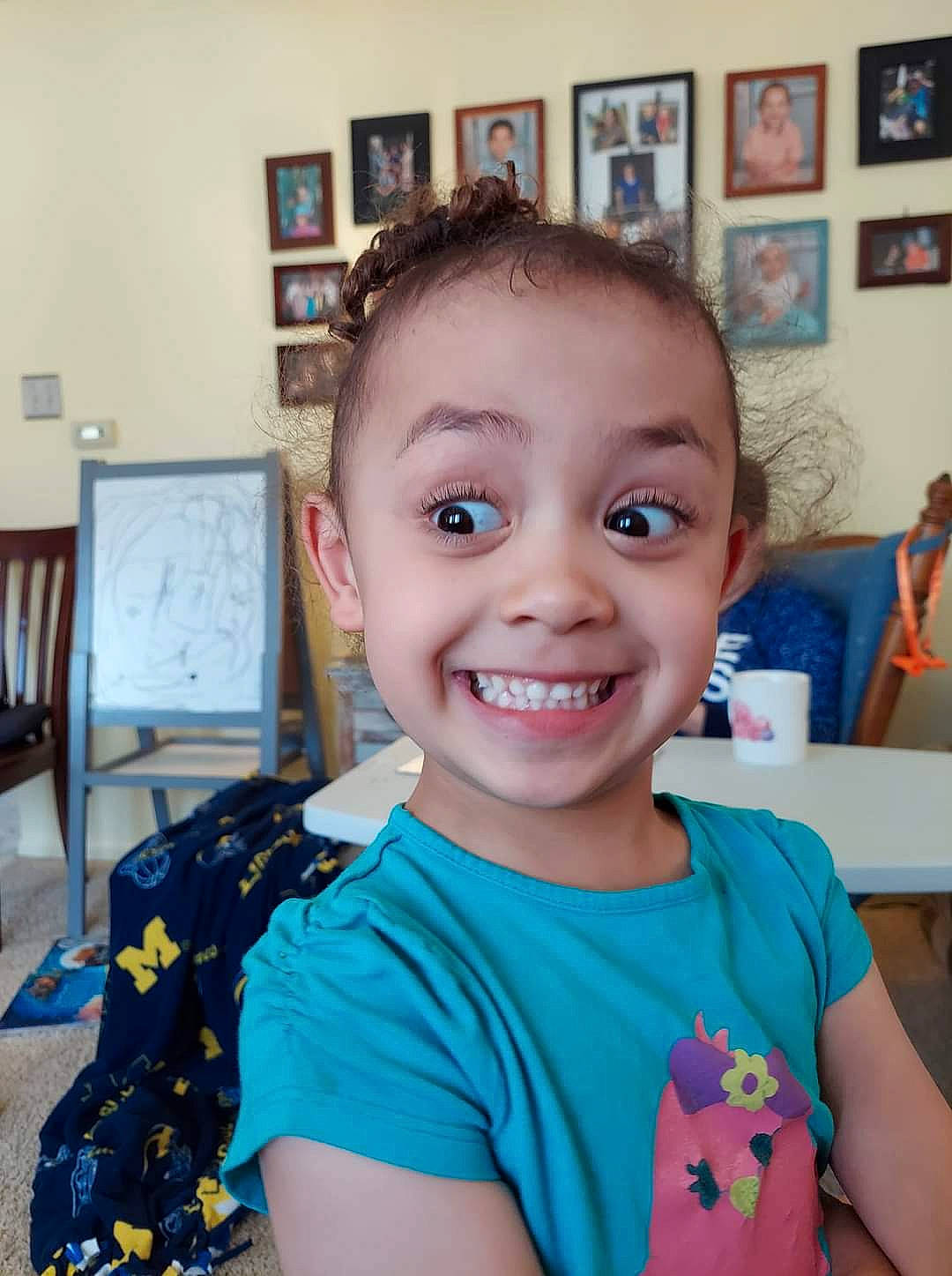 Aaylah is registered to the contest to win money with this photo: blurred, chair, cheek, child, ear, electric_blue, event, eyebrow, eyelash, fun, hairstyle, happy, iris, joy, neck, person, picture_frame, shoulder, skin, smile