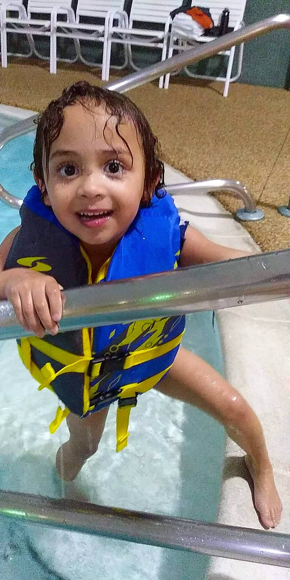 Aaylah joined the competition — help win amazing prizes! baby_products, barefoot, blue, boats_and_boating_equipment_and_supplies, child, fun, games, happy, leisure, person, personal_protective_equipment, play, recreation, shorts, sitting, smile, swimming_pool, t_shirt, toddler, vacation