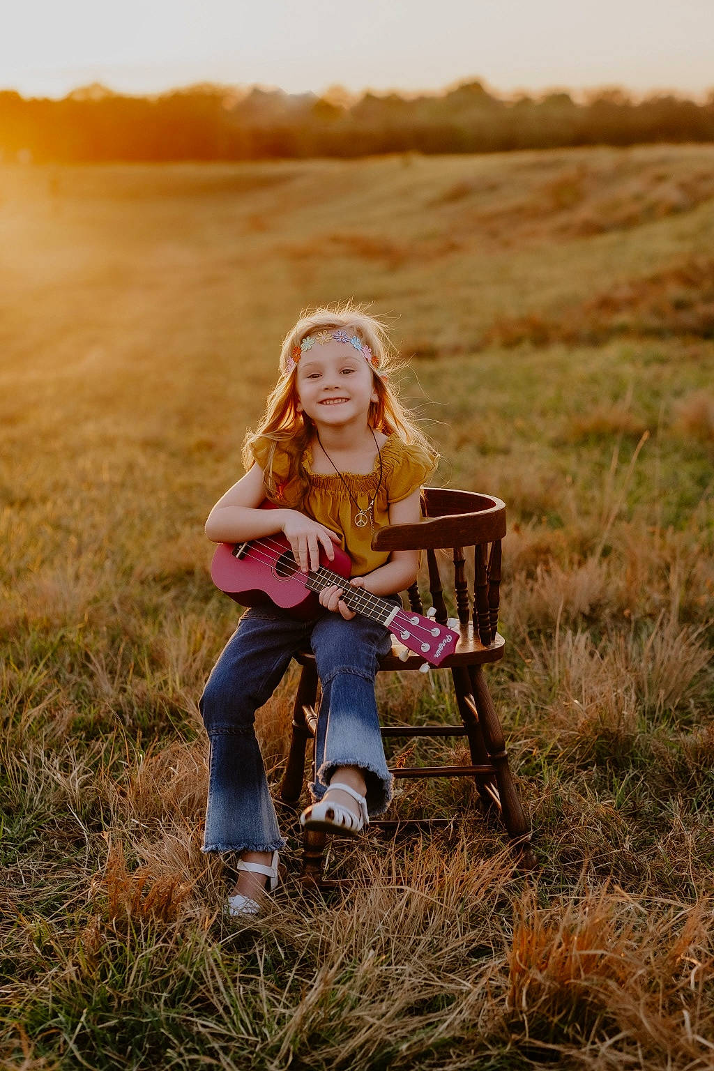 Ella joined the competition — help win amazing prizes! ecoregion, face, fawn, flash_photography, grass, grass_family, grassland, guitar, happy, headwear, jeans, joy, landscape, long_hair, meadow, nature, people_in_nature, person, plant, prairie