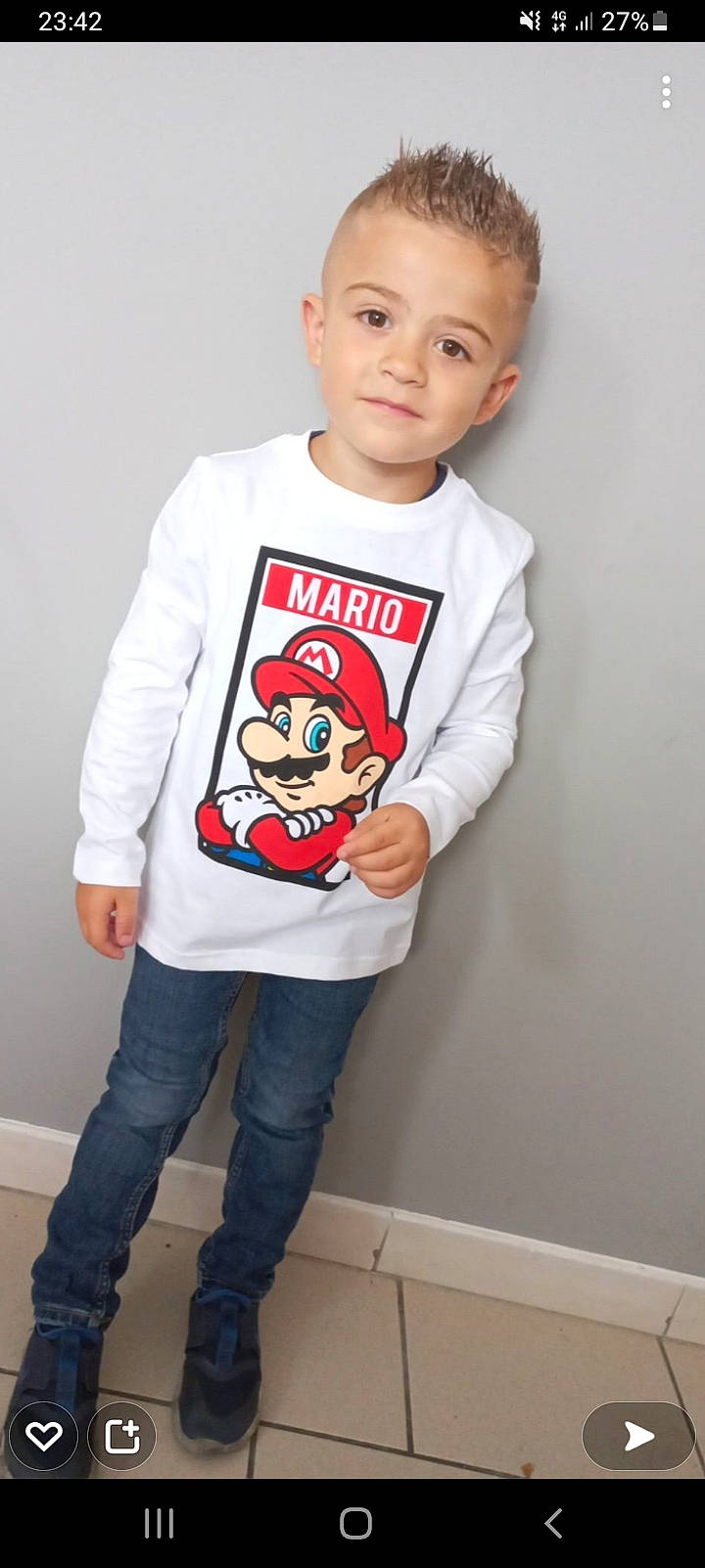 Adriano participe au concours pour gagner de l'argent avec cette photo : active_shirt, baby_toddler_clothing, child, chin, clothing, eyewear, font, grey, hair, happy, jeans, moustache, neck, outerwear, person, sleeve, smile, street_fashion, t_shirt, toddler