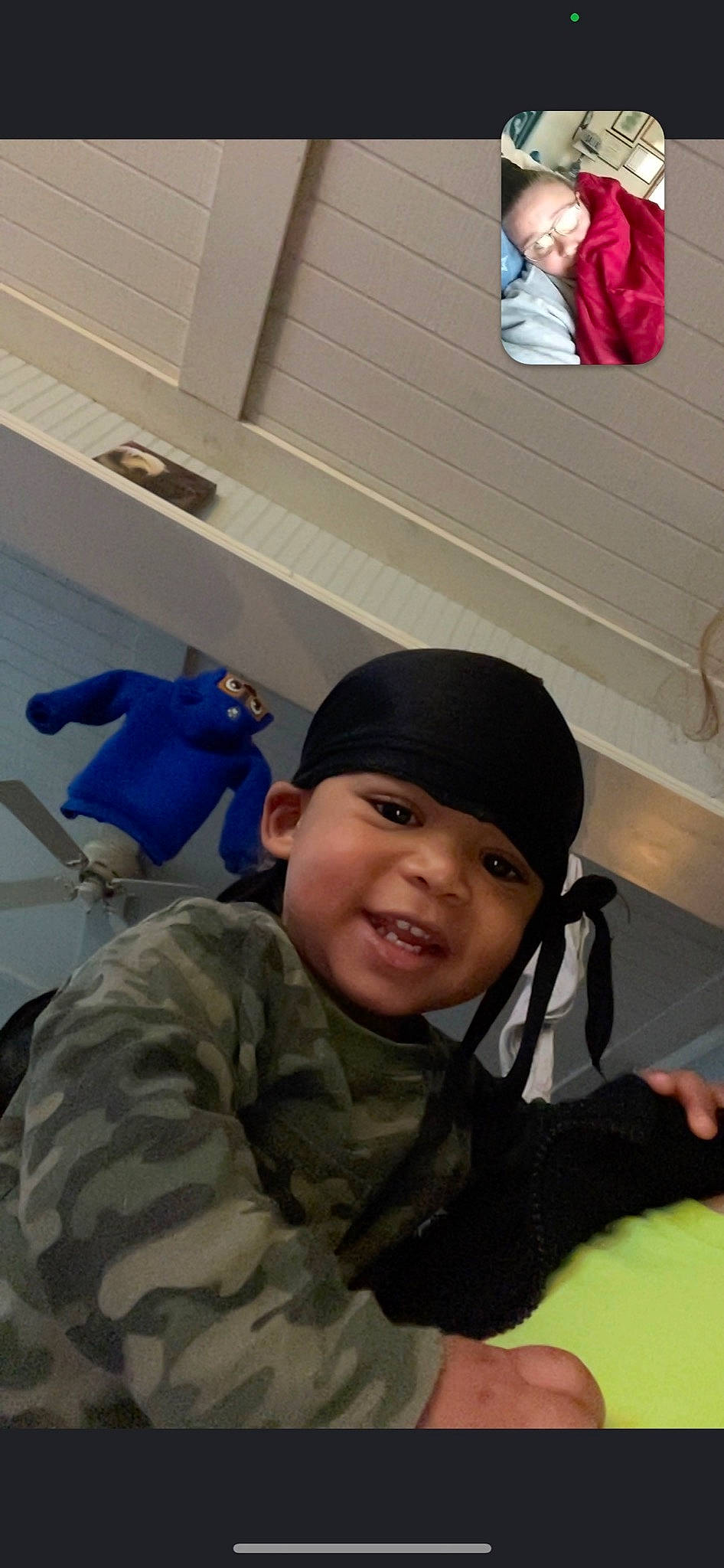 Jay is registered to the contest to win money with this photo: army, baby, cap, cheek, electric_blue, fashion_accessory, fun, headwear, military, military_camouflage, military_person, military_uniform, non_commissioned_officer, outerwear, person, personal_protective_equipment, room, sitting, smile, soldier