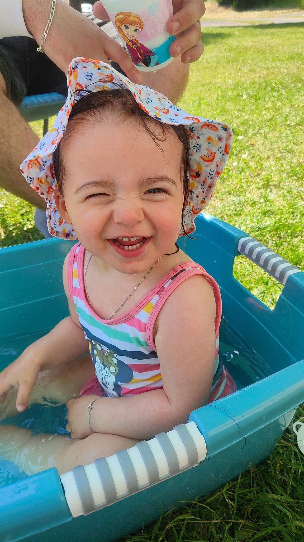 Emma participe au concours pour gagner de l'argent avec cette photo : baby_toddler_clothing, child, event, fashion_accessory, fun, grass, green, happy, leisure, magenta, people_in_nature, person, pink, plant, play, recreation, sitting, skin, smile, summer