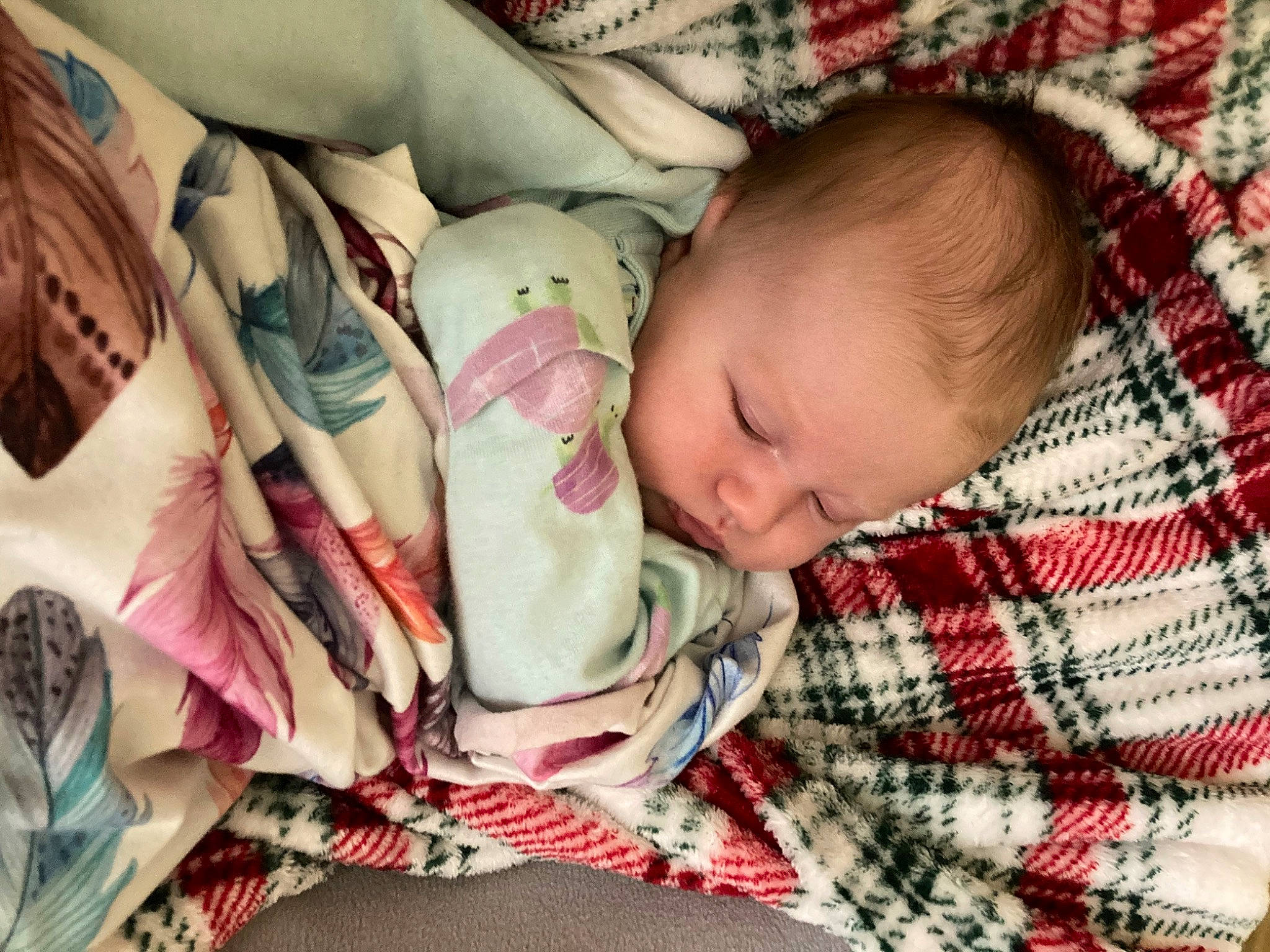 Keira joined the competition — help win amazing prizes! baby, baby_products, baby_sleeping, baby_toddler_clothing, bedtime, carmine, cheek, child, comfort, face, linens, pattern, person, plaid, product, room, skin, sleeve, tartan, textile