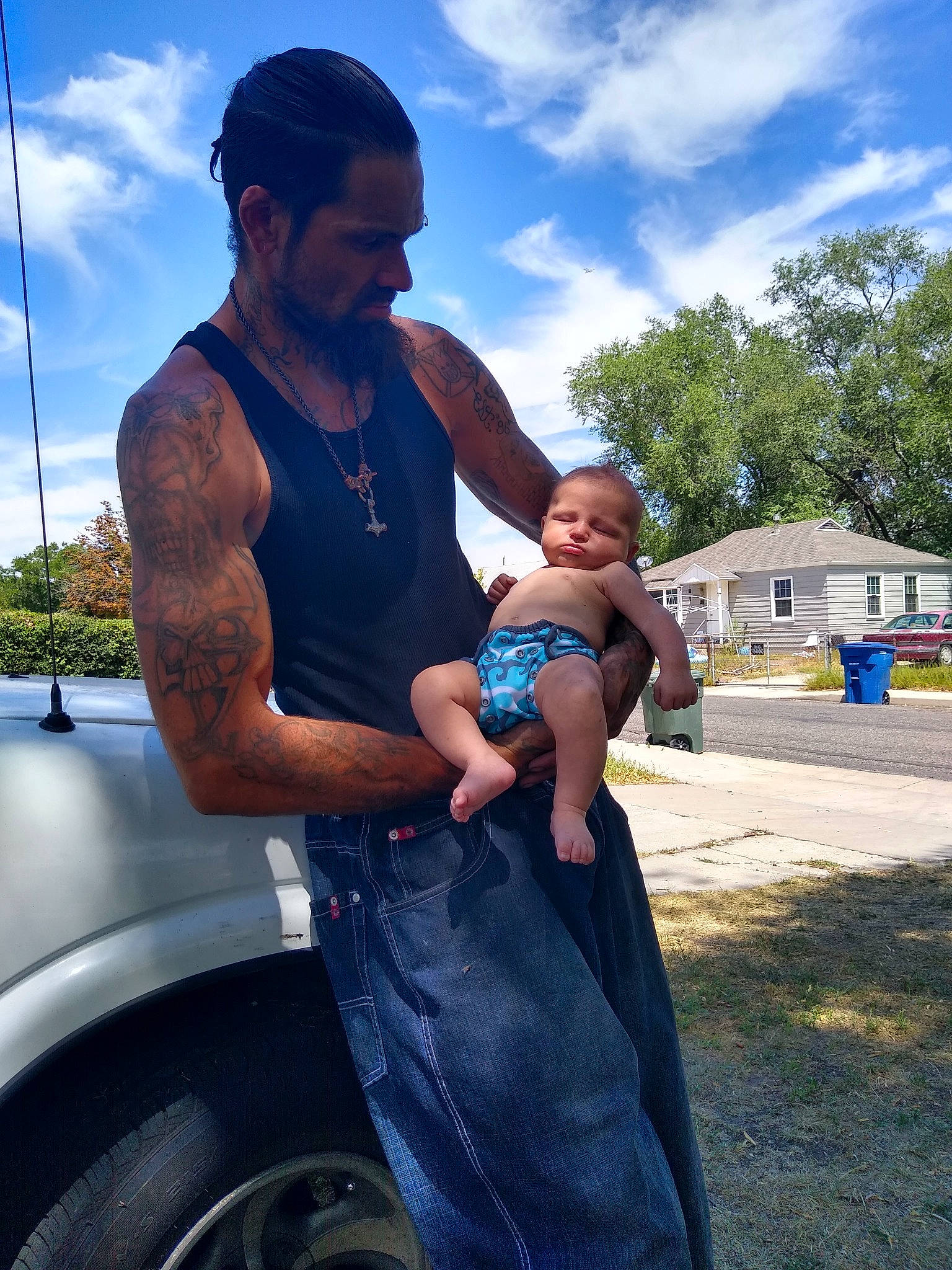 Bjorn joined the competition — help win amazing prizes! automotive_tire, car, chest, cloud, cool, face, fender, fun, hairstyle, human_body, leg, muscle, person, plant, shorts, shoulder, sky, tire, tree, trunk