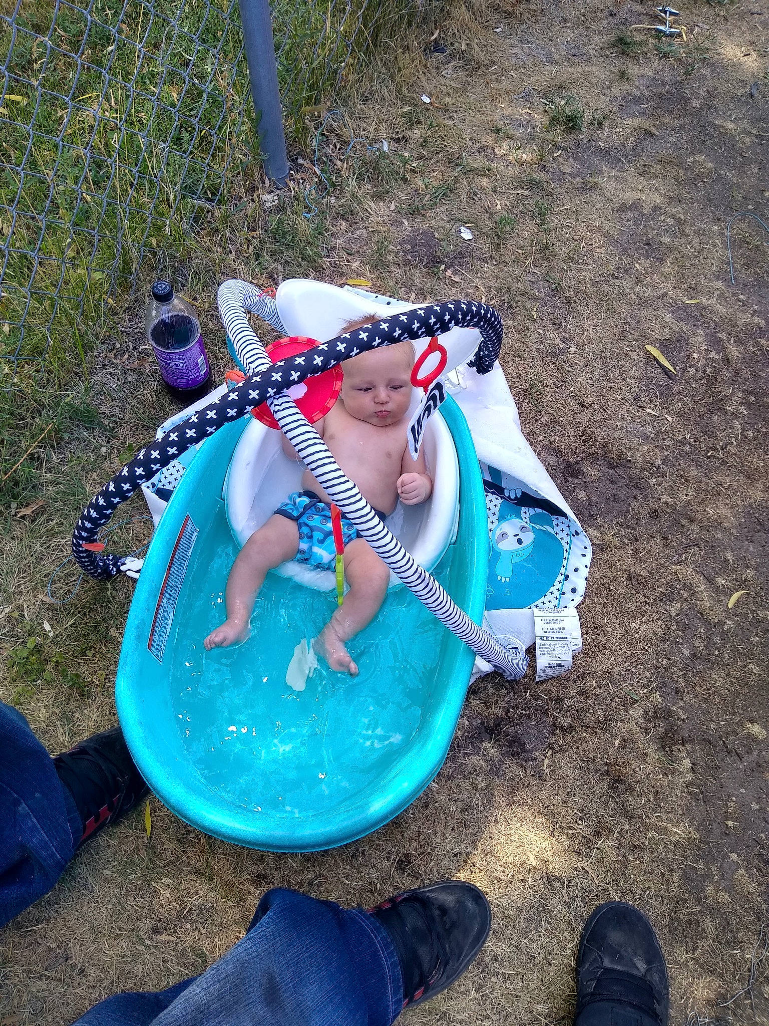 Bjorn is registered to the contest to win money with this photo: baby, baby_products, blue, child, clothing, electric_blue, fashion_accessory, foot, fun, grass, headwear, jeans, leisure, people_in_nature, person, plant, play, recreation, shadow, toddler