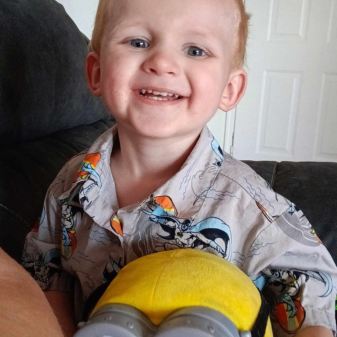 Oliver joined the competition — help win amazing prizes! architecture, baby, building, couch, cushion, face, furniture, happy, head, homedecor, indoors, laughing, livingroom, person, photography, plush, portrait, room, smile, toy