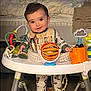 Jack joined the competition — help win amazing prizes! baby, child, activity_walker, toy, pajamas, bib, smile, indoor, bed, curtains, floor, feet, face, person, furniture, play, infant, cute, home, light